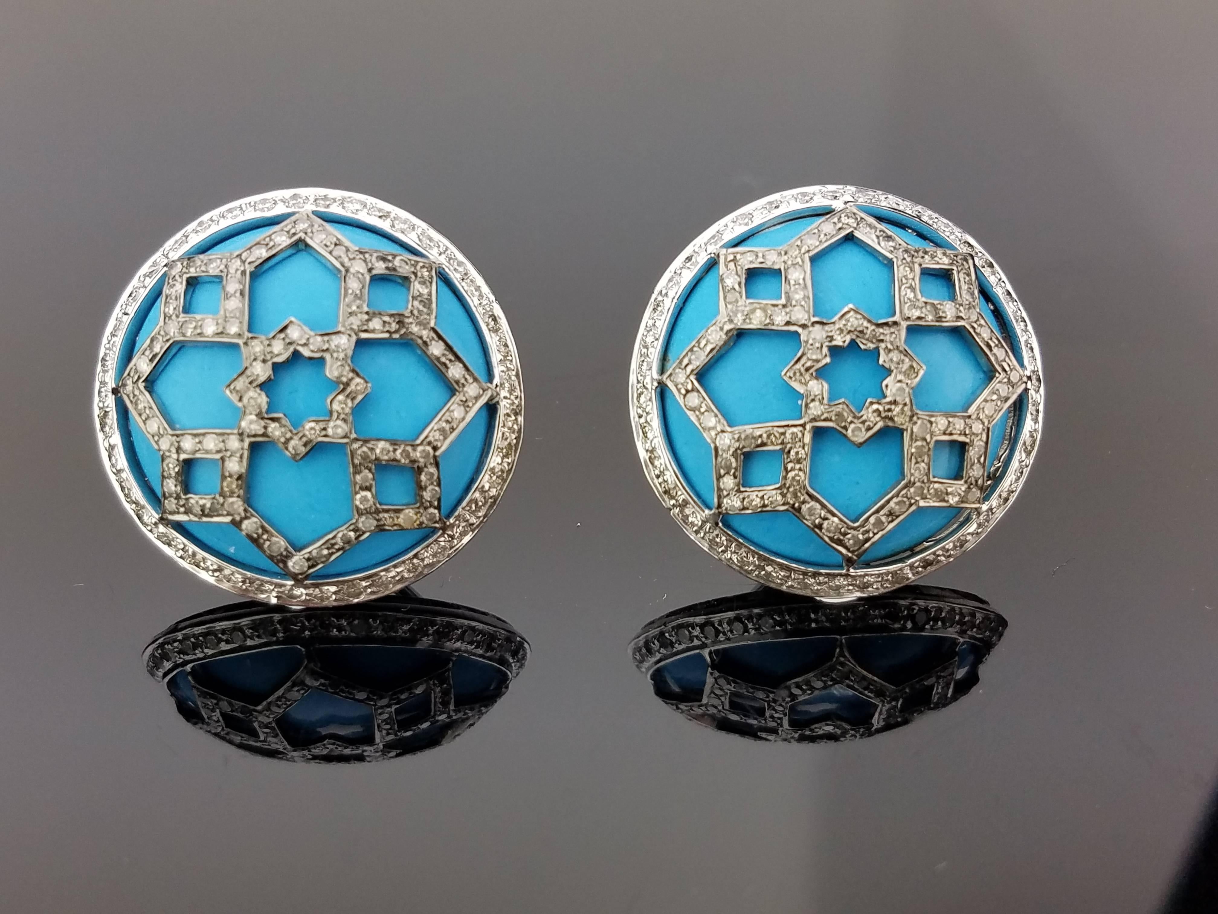 An art deco looking jewellery suite, comprising of ring and studs earring using Turquoise Cabochon and Diamonds, all set in 18K Gold. 

Earring Details:  43.5 carat Turquoise / 2.15 carat Diamond
Ring Details: 22.75 carat Turquoise / 1.09 carat