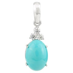 Colgante gota cabujón de turquesa unisex con circonita cúbica en plata de ley