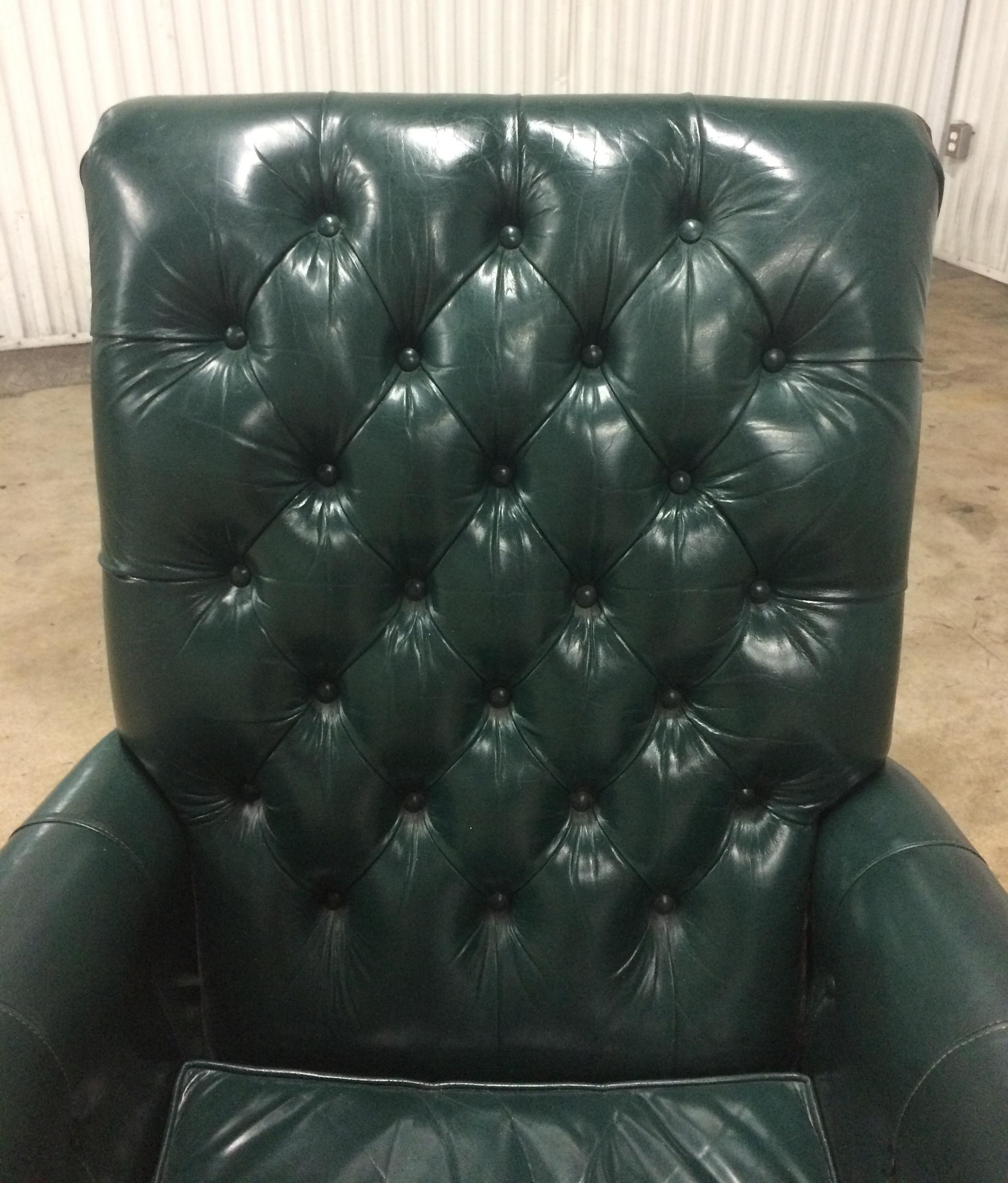 green leather tufted chair