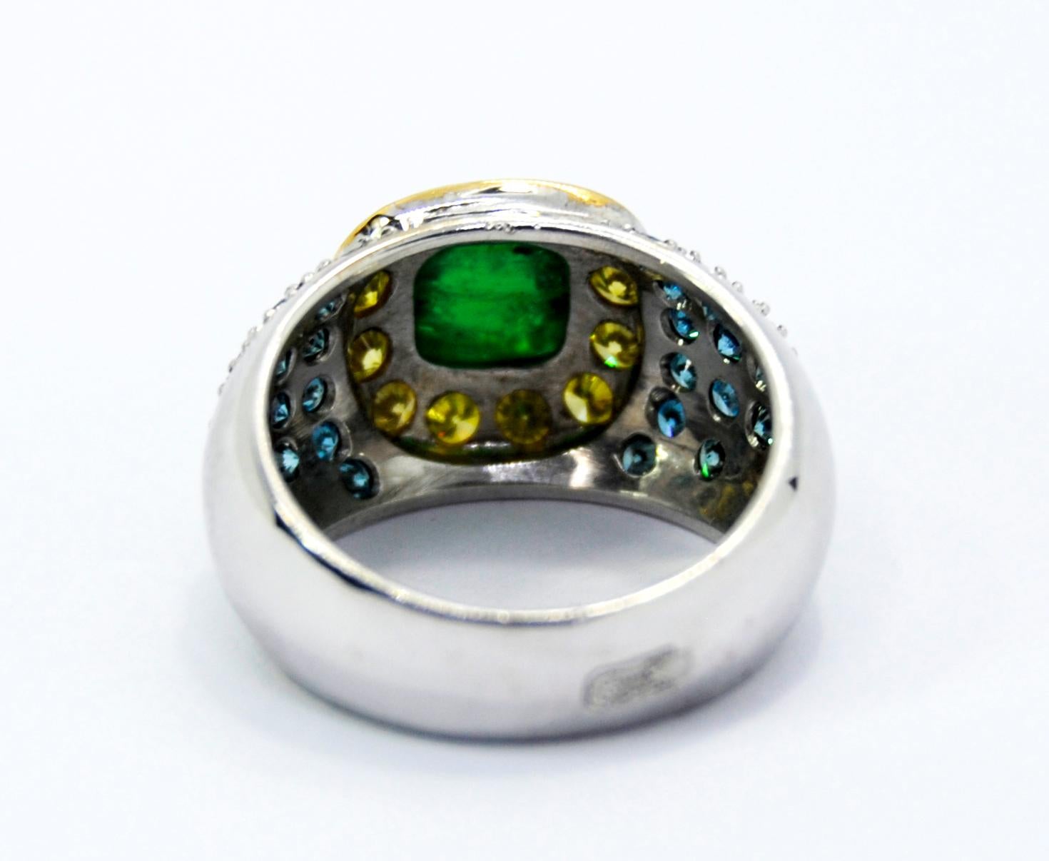 Women's Cabouchon Emerald in a Tray of Blue and Yellow Diamonds in a 18 Karat White Ring For Sale