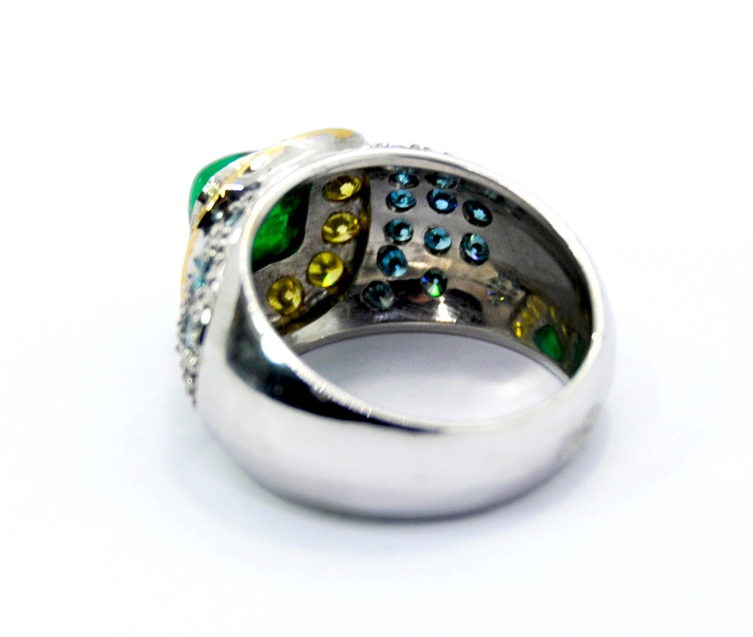Cabouchon Emerald in a Tray of Blue and Yellow Diamonds in a 18 Karat White Ring For Sale 1
