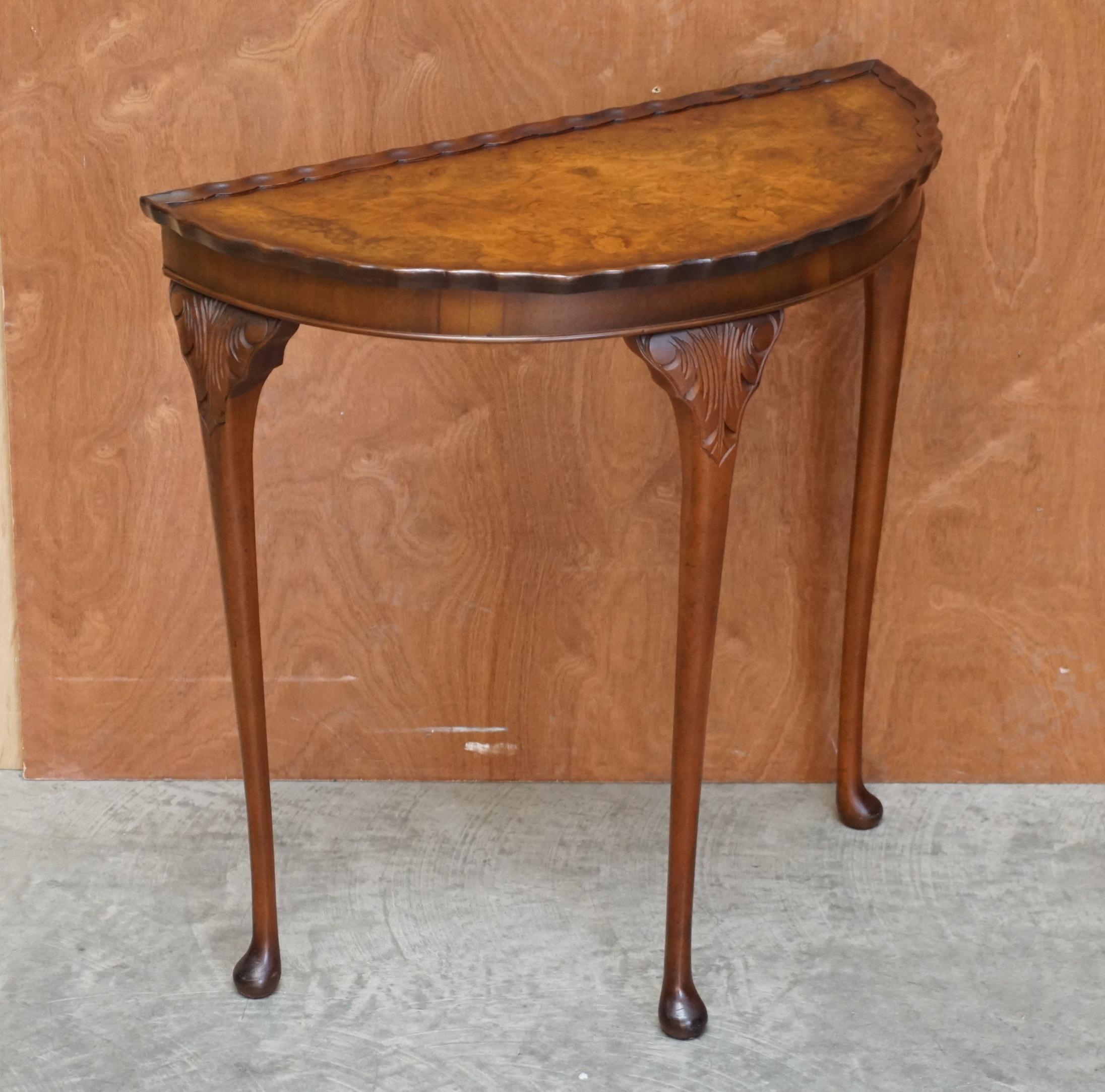 We are delighted to offer for sale this lovely vintage Art Deco style burr walnut demi lune console side table.

A very well made and good-looking piece, it’s very decorative, the burr walnut has a rich warm patina, the scalloped edge is a detail