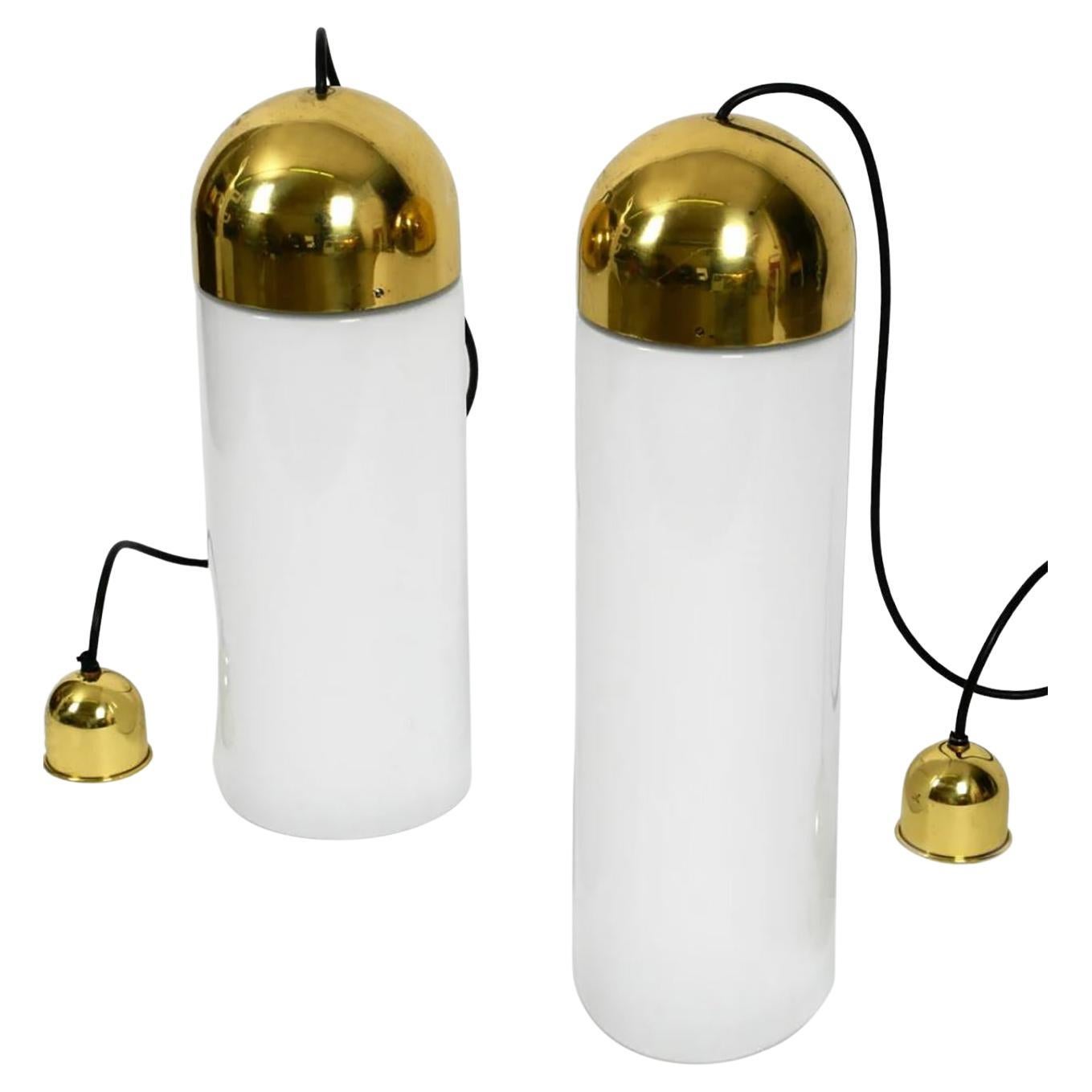 3 Large cascade heavy quality glass lamps with brass dome. Beautiful, thick flashed glass. It is closed at the bottom and curved inwards.
The all come from a church in Germany. 

A unique light object that is not only used for lighting but also as a