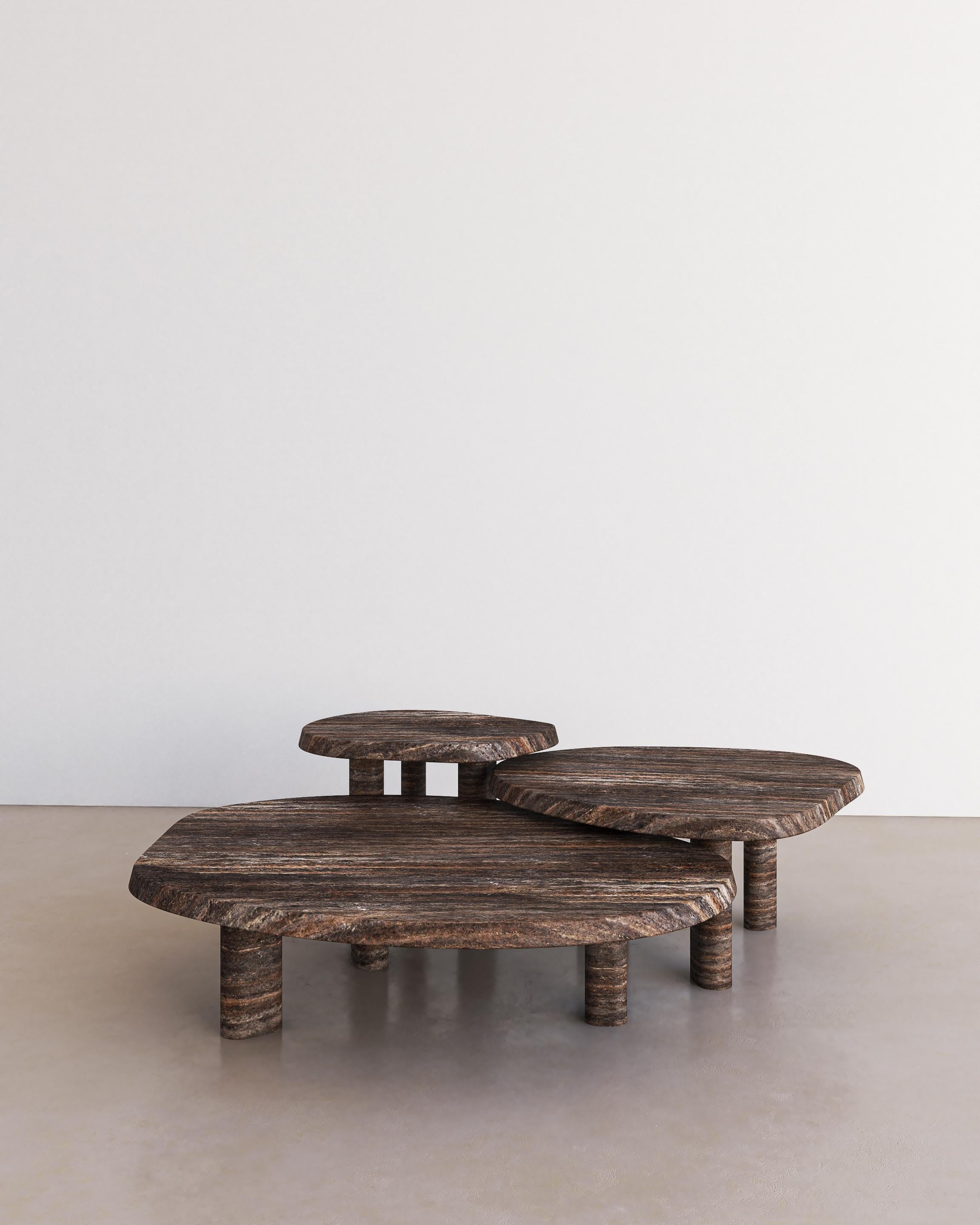 The Fiori Coffee Table in Cacao Travertine by The Essentialist infers a delicate sense of organicism, a vision of sublime is born, revolutionising beauty and deifying stone in its truest expression. Fiori forges a perpetual statement of intuitive
