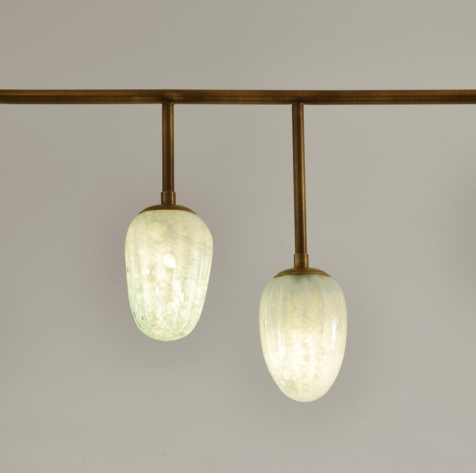 Organic Modern Brazilian contemporary pendant lamp in patinated brass For Sale
