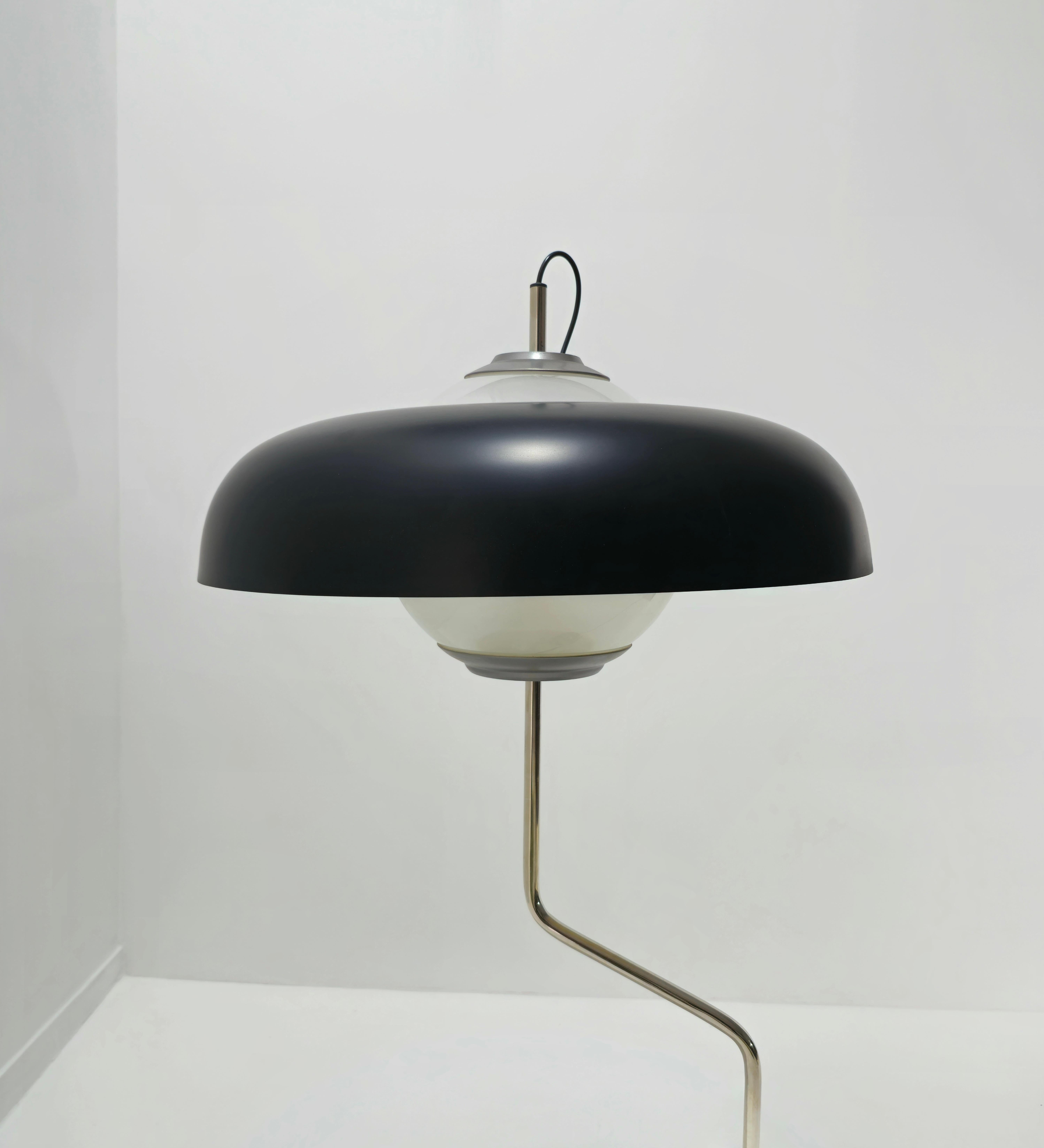 Rare Mikado lamp by Milanese architect Luigi Caccia Dominioni, for Azucena. An elegantly stepped neck in nickel-plated brass rises from a granite base and supports a large frosted glass globe (three E14 bulbs) surrounded by a massive rounded shade