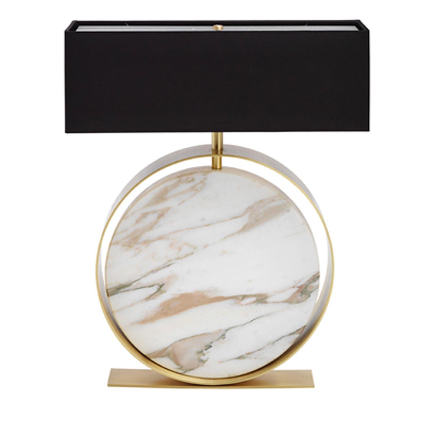 From a collection of marble table lamps in three different shapes, the Caccia Round Table Lamp is slightly quirky, but all luxury. Featuring a circular slab of Calcutta gold marble surrounded by a brass ring with a satin finish, the lamp is topped