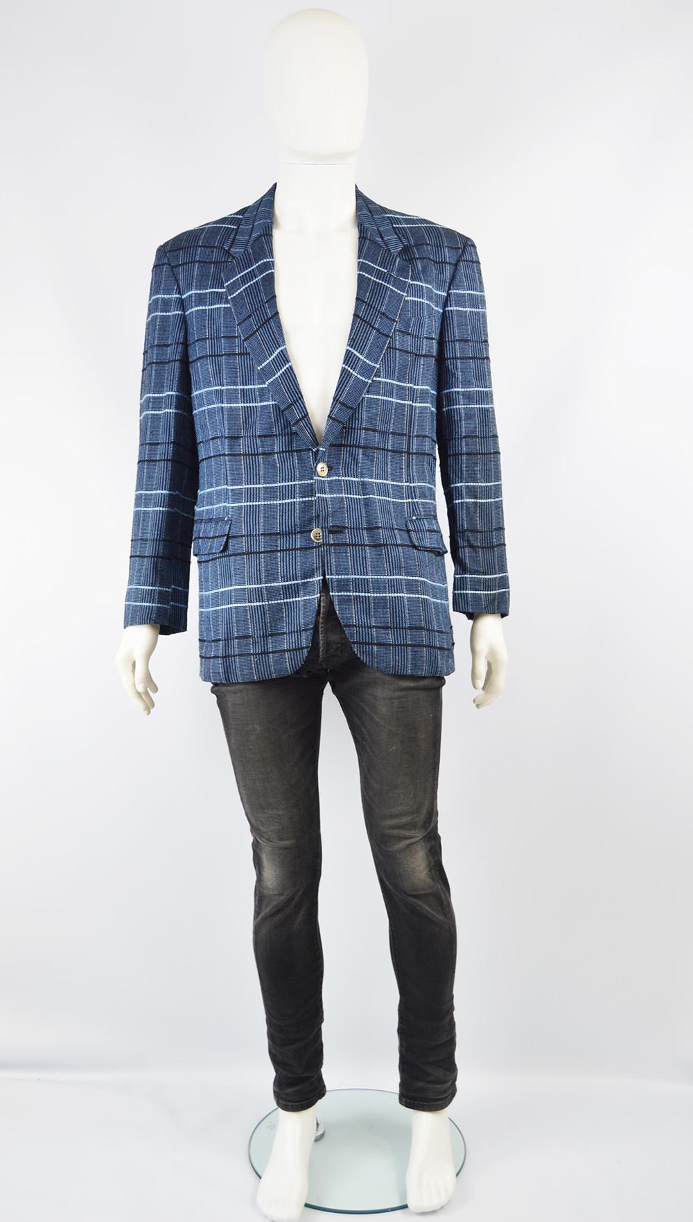 A stylish vintage men's blazer jacket / sportcoat from the 90s by luxury French ready to wear label, Cacharel. In a blue and black woven viscose-linen blend. Single breasted with flap pockets and a classic design that lets the bold fabric speak for