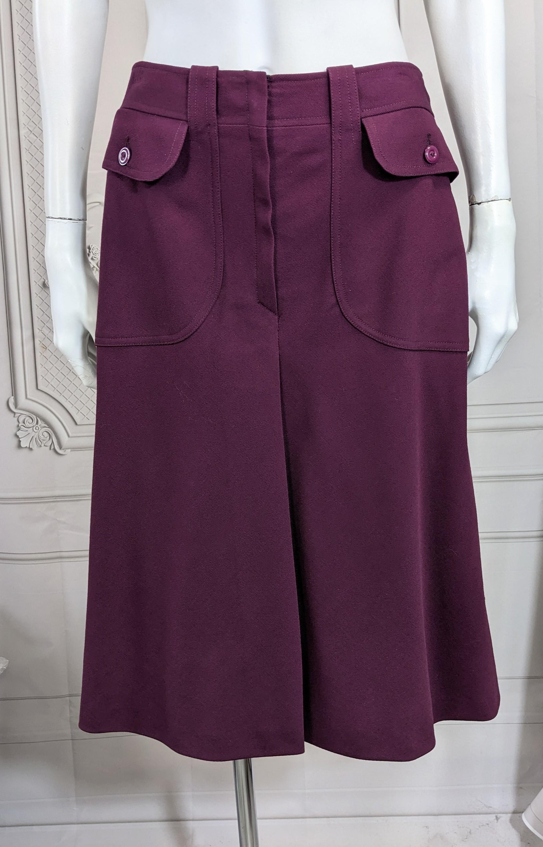 Charming Cacharel Wool Twill A Line Skirt from the 1970's. Burgundy wool twill bias cut A line shape with pockets and shaped waistband. Fuller cut in back with center pleat. 1970's France. 
Vintage size 10, fits like a Modern 2. Waist 26