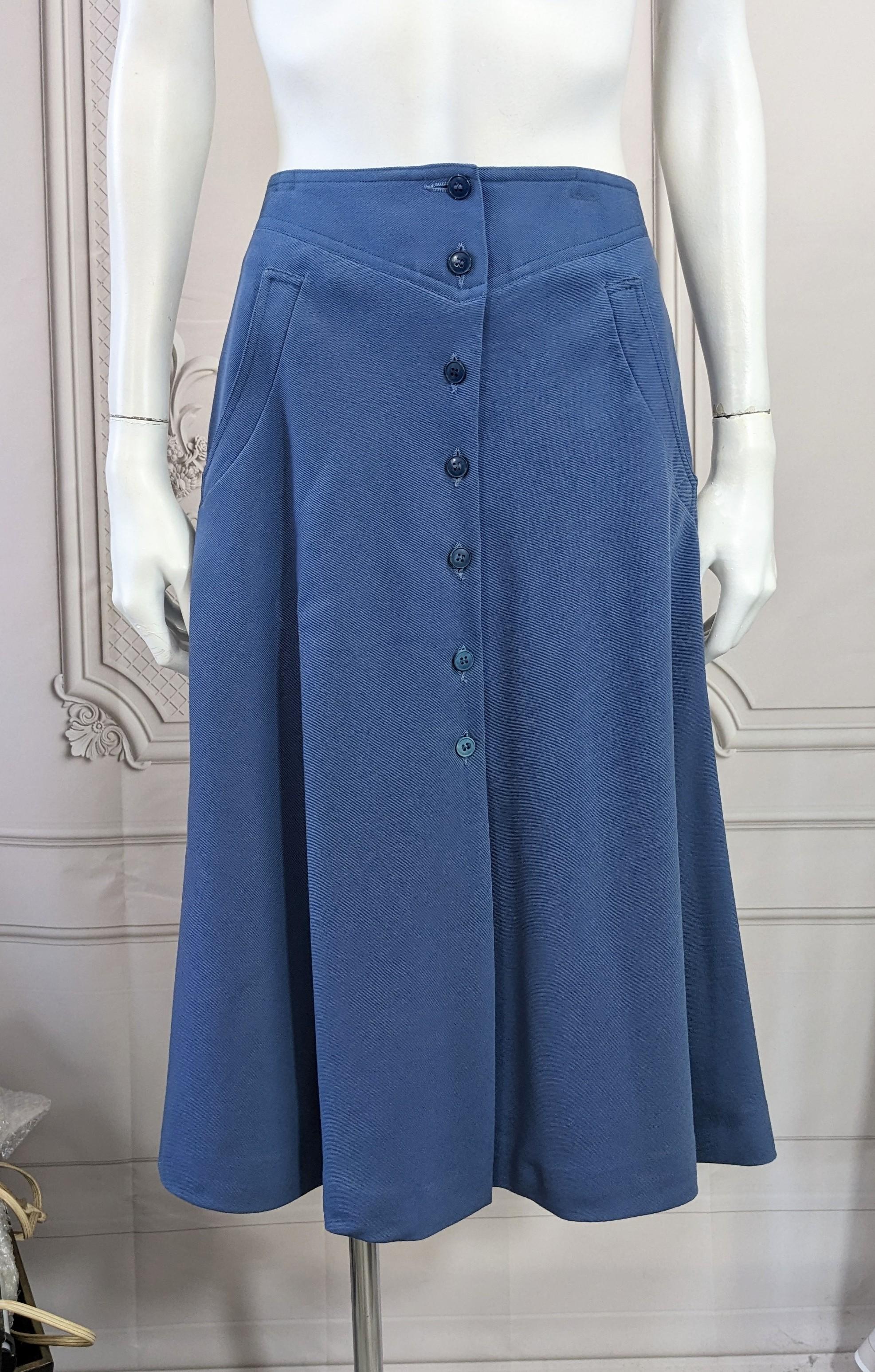Cacharel Wool Twill A line Skirt with button front closures. Soft wool twill in a full A line shape with unusual curved pockets. Vintage size 10, Modern 0-2. Waist 26