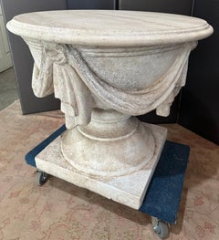 Cache` Swag decorated Stone Base Table, Travertine Top