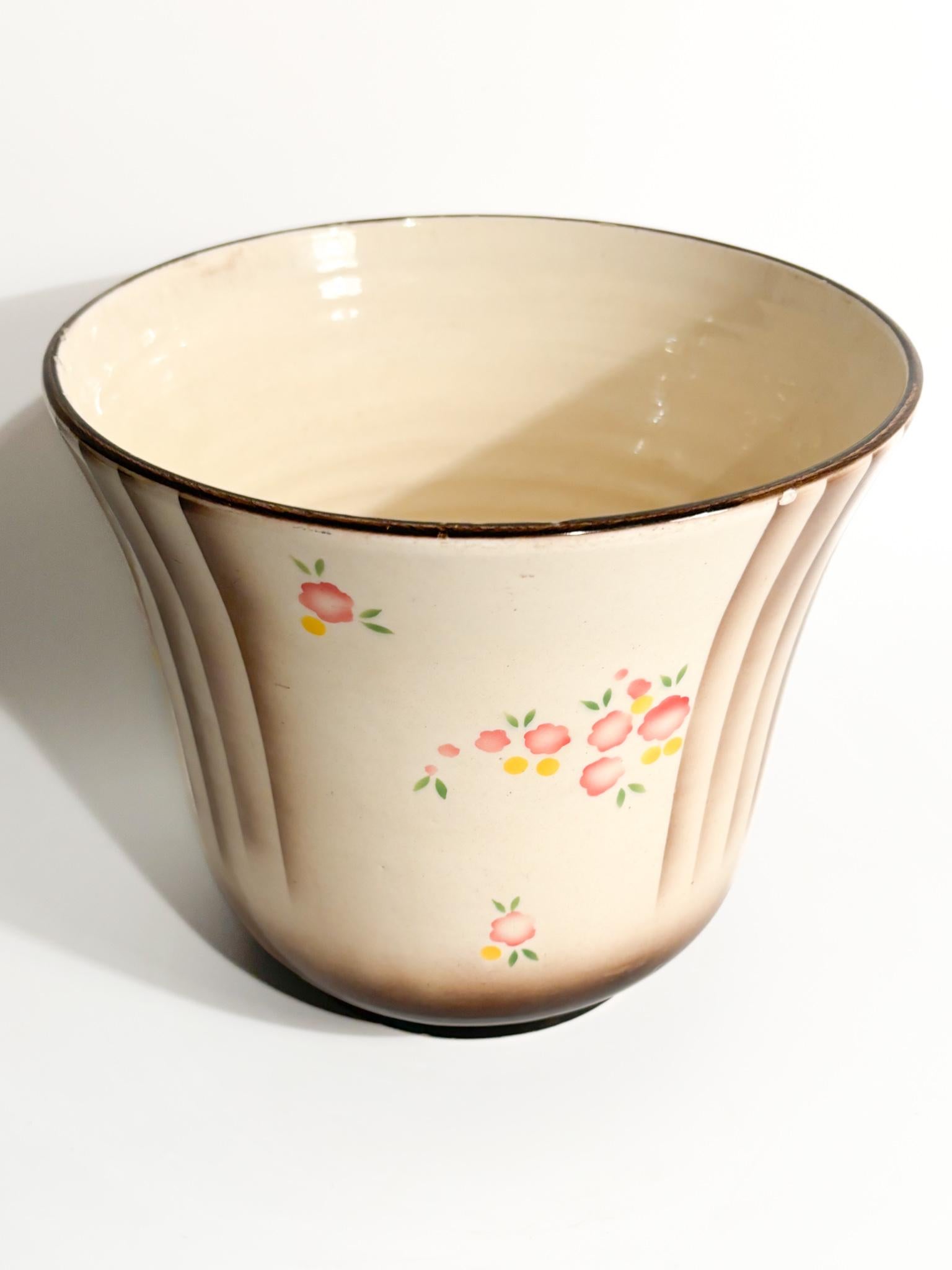 Übertopfvase aus Keramik von Galvani Pordenone, Luftdruck, hergestellt in den 1940er Jahren

Ø cm 18 h cm 20

Ceramiche Galvani war ein historischer italienischer Keramikhersteller mit Sitz in Pordenone, Venetien. Die 1825 von Andrea Galvani