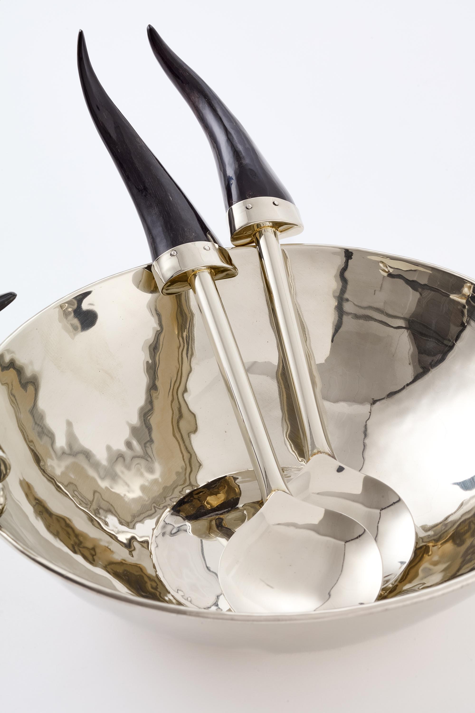 The Cachi line is inspired by the town of Cachi, nestled in the province of Salta.
This collection of handcrafted home objects includes trays, champagne buckets, and bowls — each one entirely hammered by hand.

Crafted from alpaca silver and adorned