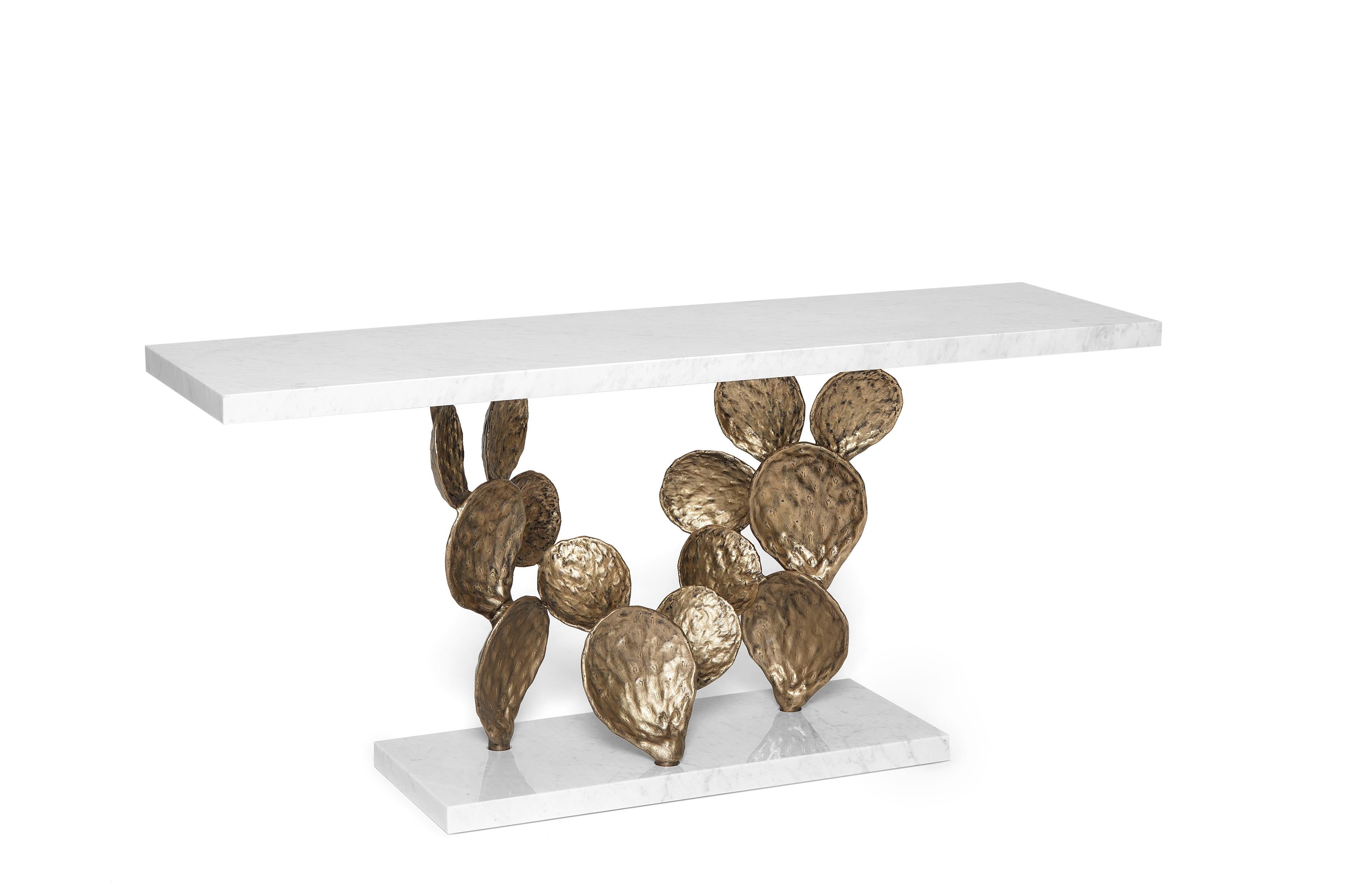 Cactus 180 Console by Ginger & Jagger
Dimensions: D 50 x W 180 x H 83 cm. 
Materials: Carrara marble and brass.
Finish: Top and base in Carrara marble in polished finishing; structure in cast brass in Antique Brass finishing.

This product is