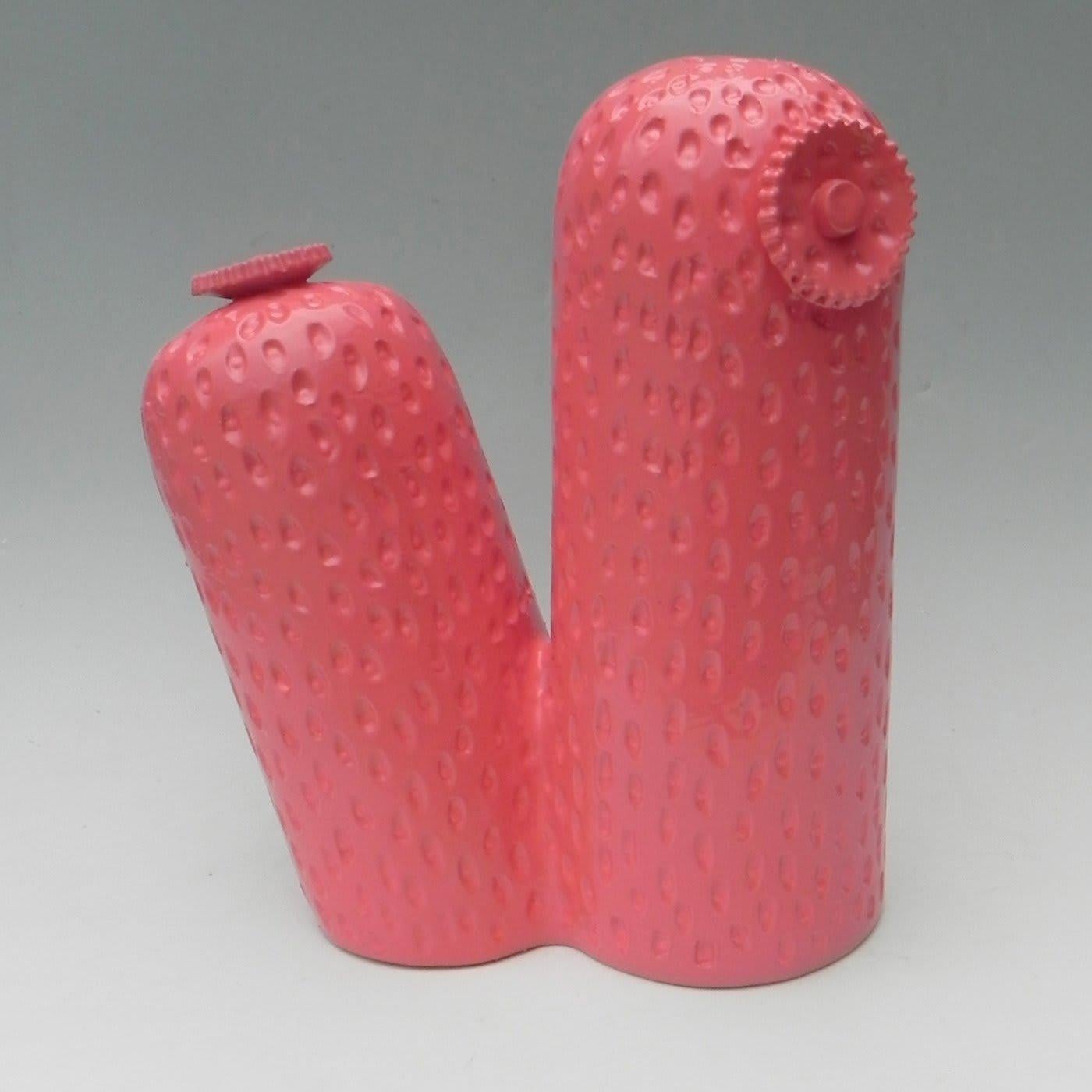 This stylish decorative piece of two crowns of cactus, each with a flower on the side, will bring a whimsical touch into any interior with its striking, hot pink color and life-like finish. Designed by Tullio Manzotti, this ceramic sculpture is part