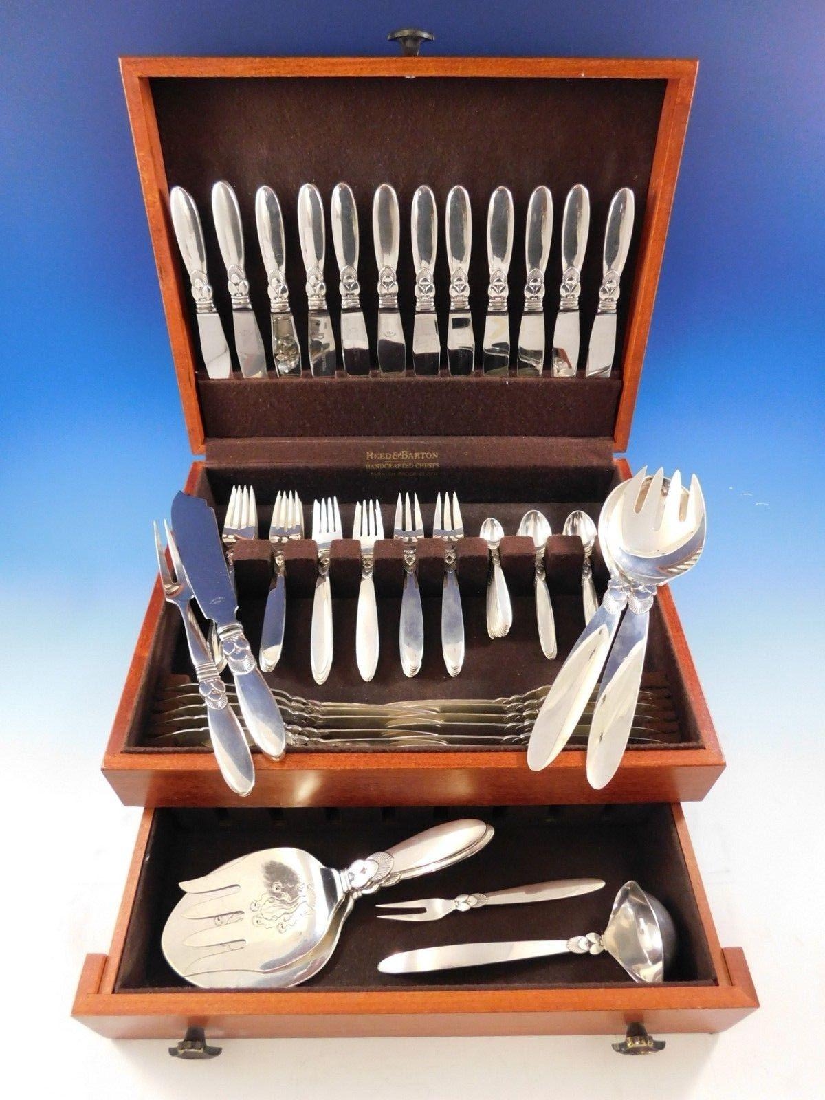 Cactus by Georg Jensen Danish sterling silver flatware set of 92 pieces. This set includes:

12 knives, long handle, 8