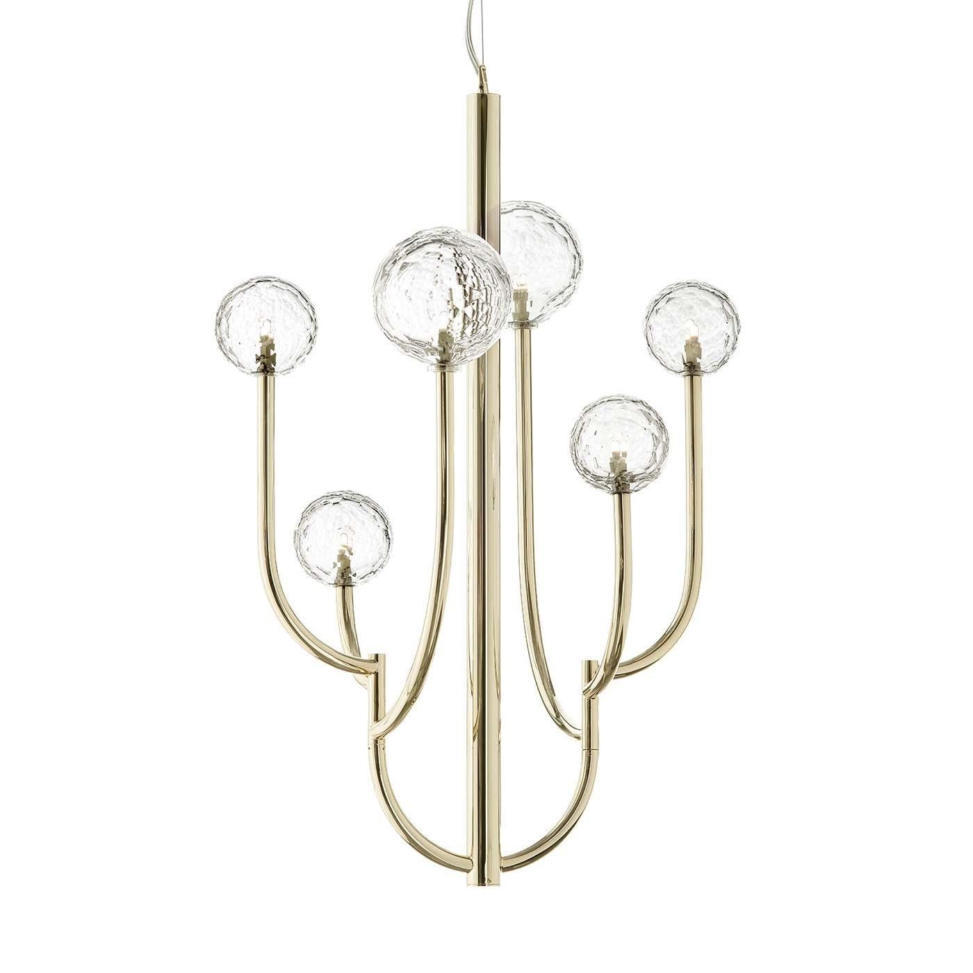 Sophisticated and unique, this chandelier has a minimalist metal frame with a soft gold finish showcasing six globes of hand-cut Italian crystal arranged at different heights. Mounted on a central pole, the two arms are placed facing each other as