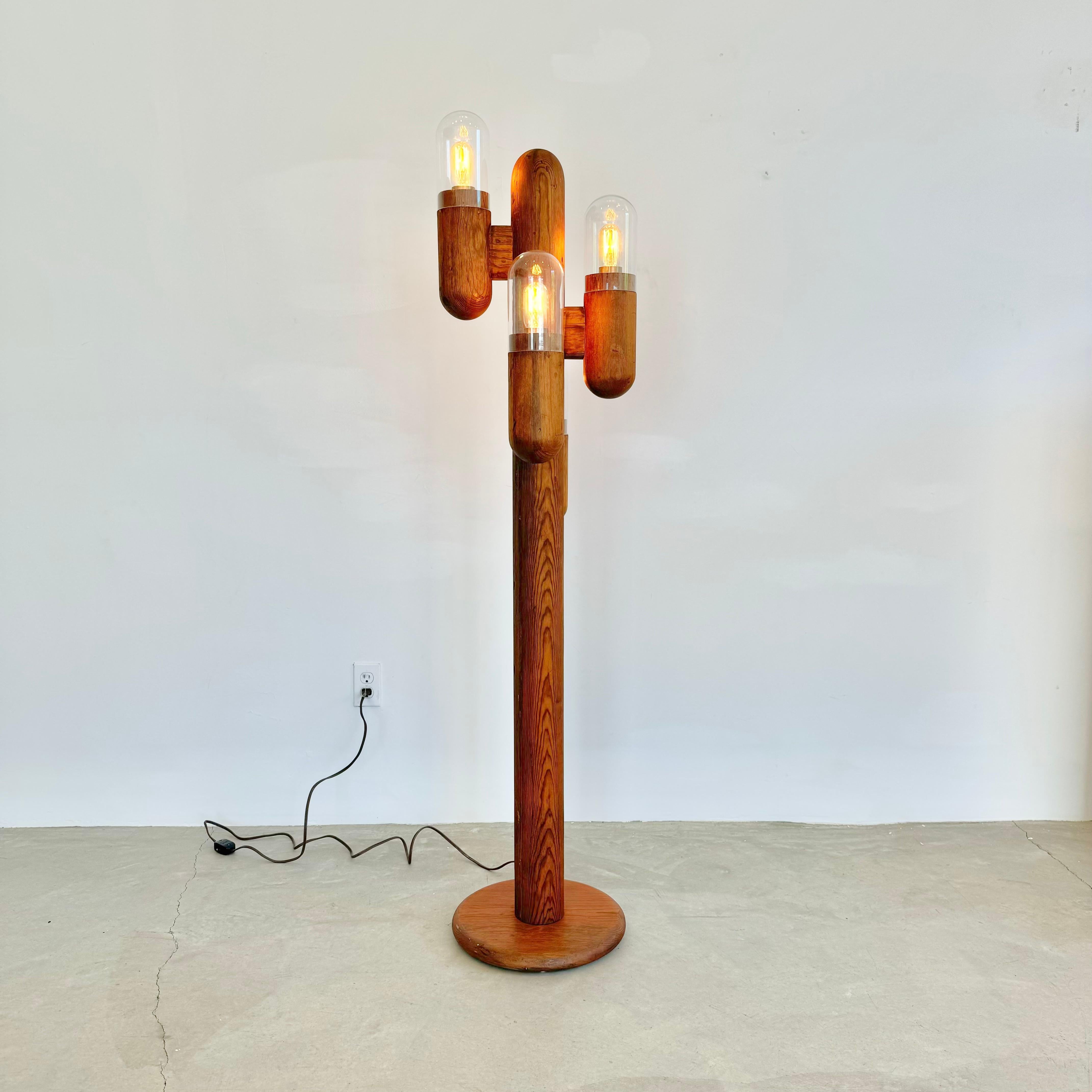Stunning cactus floor lamp made of California pine. Designed and manufactured by Modeline in California during the 1970s. Four branches with dimmable sockets and Edison bulbs. Four original glass globes top each branch. Great vintage condition.
