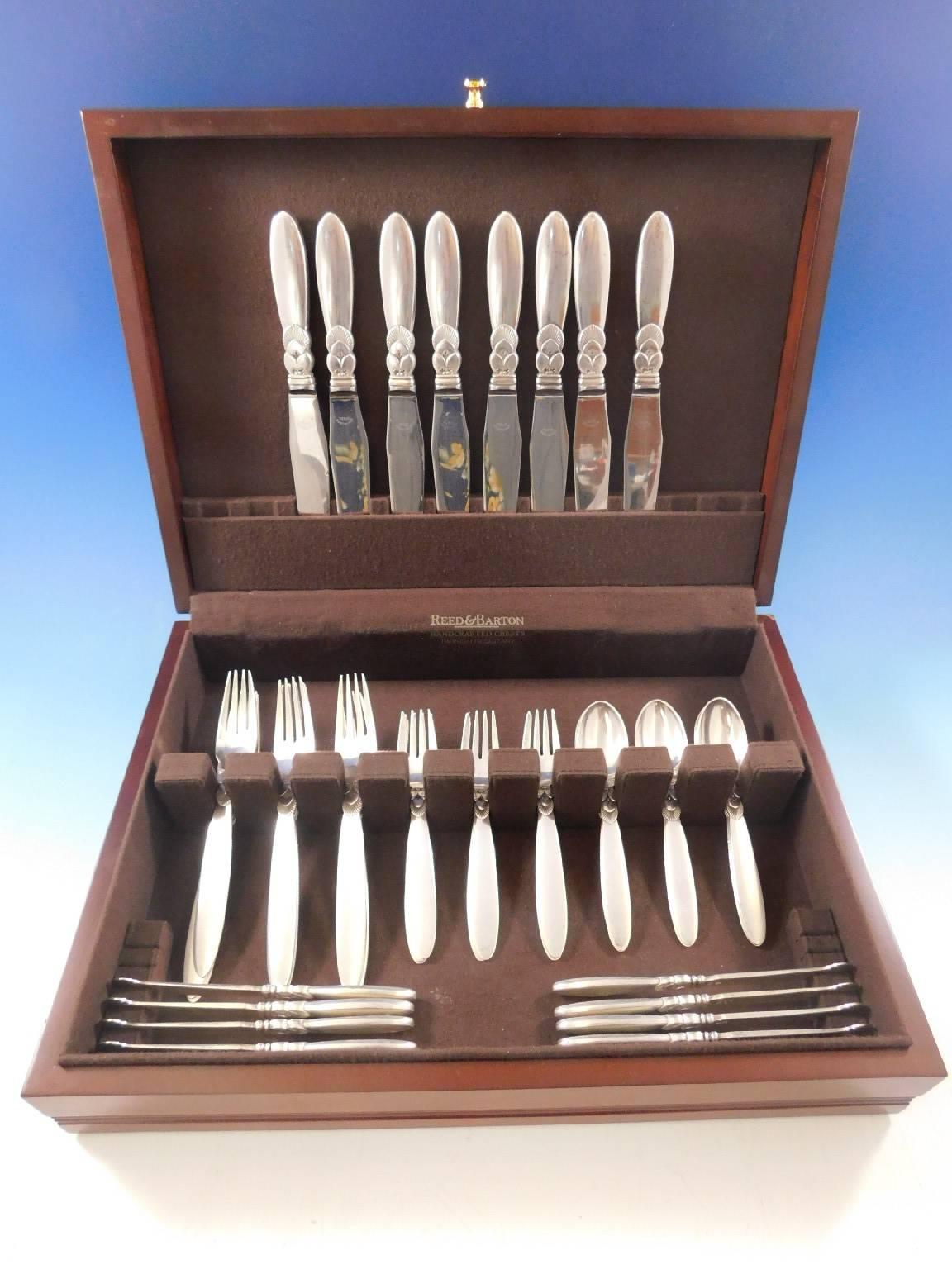 Outstanding early dinner size Cactus by Georg Jensen sterling silver flatware set, 40 pieces. This set includes:

Eight dinner knives, 9