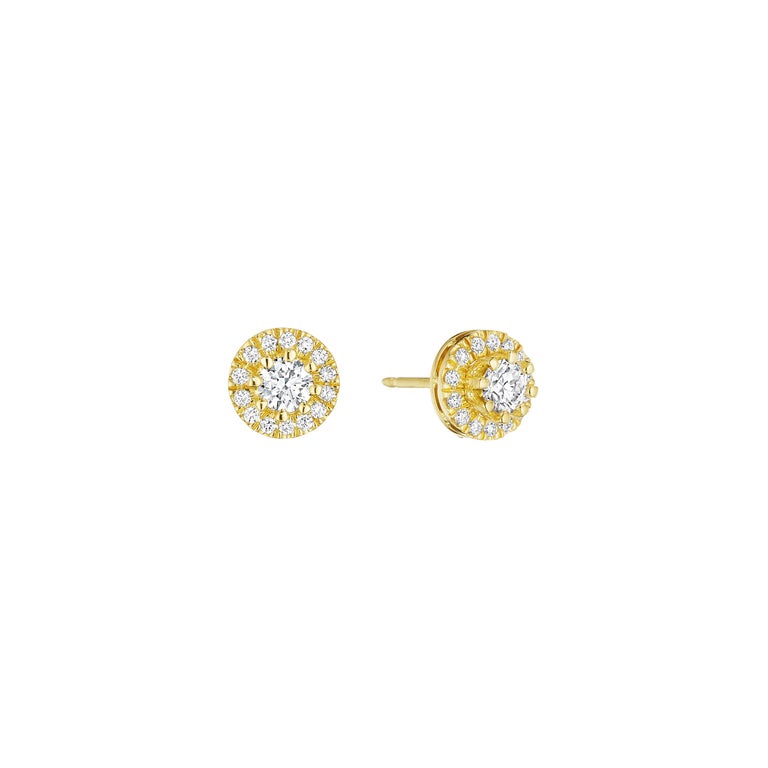Where water meets sky. A series of concentric ripples evoke the dance of sunlight across the ocean and off into the horizon. Handcrafted in high polished 18K yellow gold and 1.51cttw G-VVS2 white diamonds. Removable stud earrings may be worn