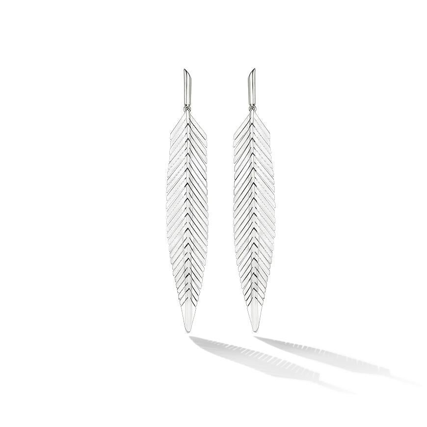 Take flight. These dramatic statement earrings flutter with each movement and beautifully elongate the neck. Handcrafted in 18k high polished gold. The Second Skin: Feather earrings are meticulously handcrafted to replicate the delicate movement and