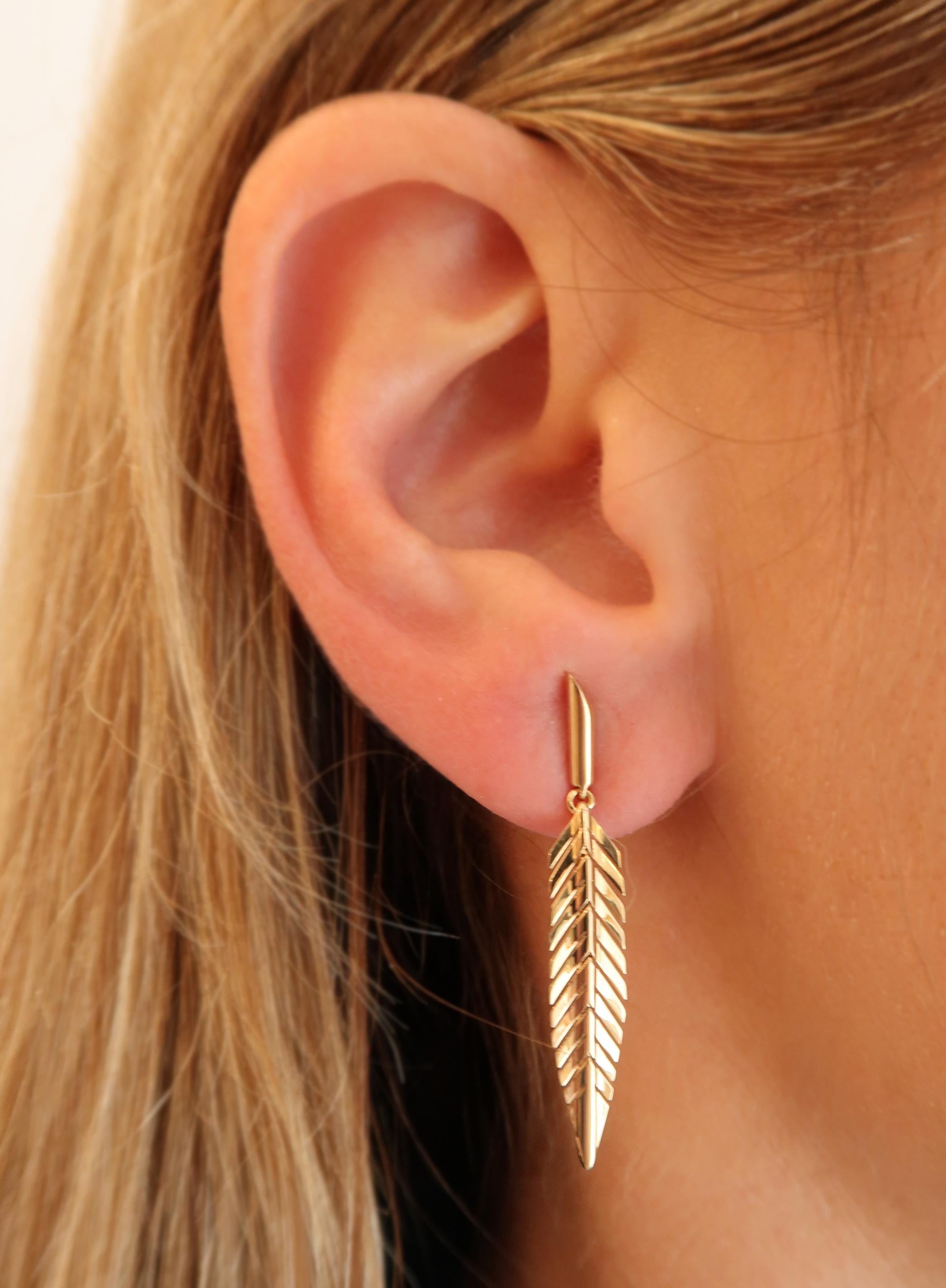 Take flight. These earrings flutter with each movement and are ideally suited for everyday wear. The Second Skin: Feather earrings are meticulously handcrafted in 18K high polished gold to replicate the delicate movement and lightness of a feather.