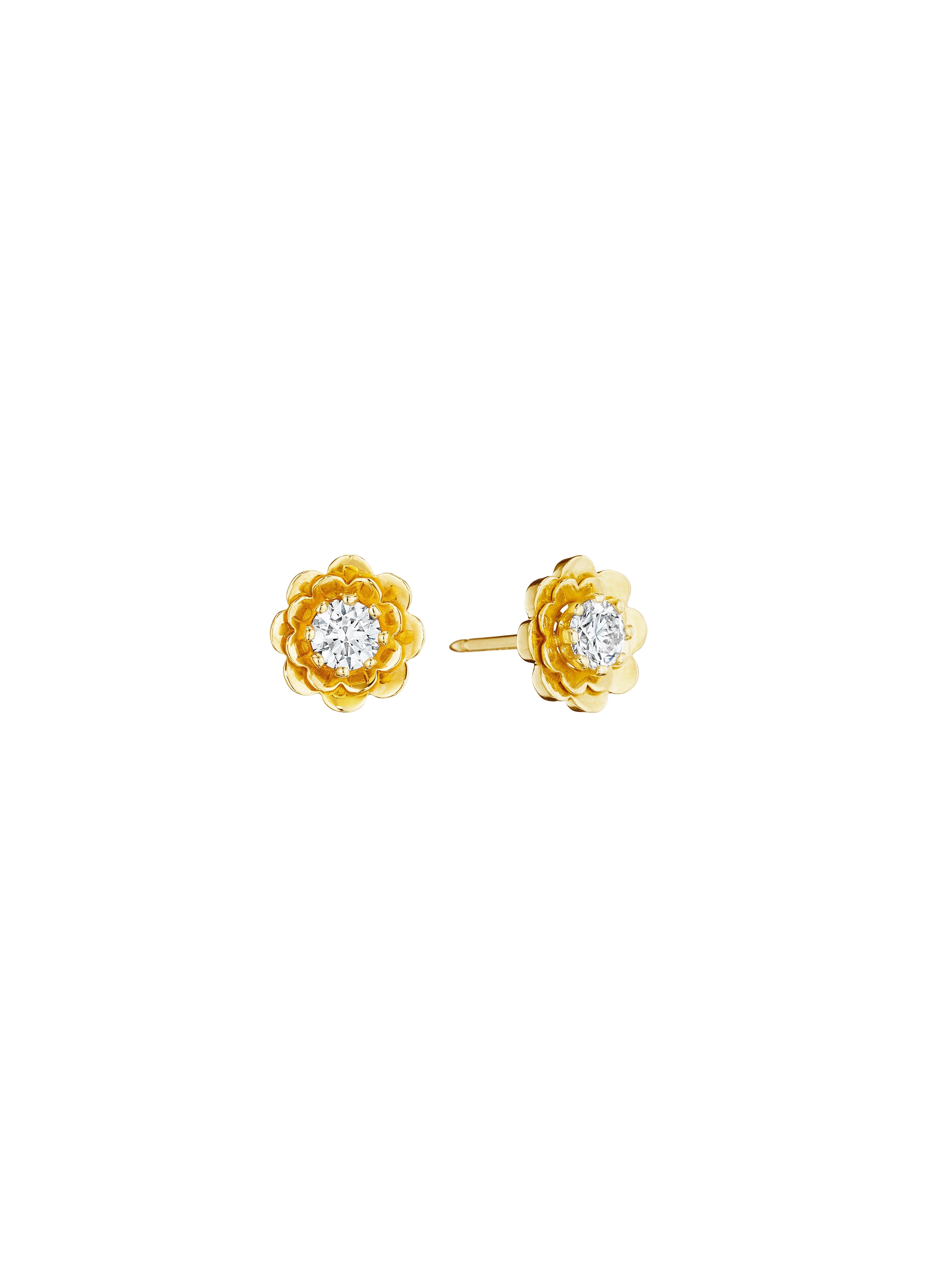 In full bloom. Elegance and high-voltage drama meet in these versatile earrings that can be worn as classic studs or elongated tassels. Handcrafted in 18k high polished gold and 3.44cttw white diamonds. GIA Certificate available.

From the CADAR