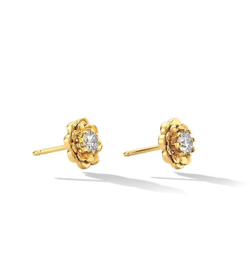 Diaphanous, intricately detailed blooms. A lacy petal pattern adorned with a single glimmering diamond offers a fresh take on classically elegant, versatile studs. Handcrafted in high polished 18K yellow gold and .47cttw G-VVS2 white diamonds. GIA