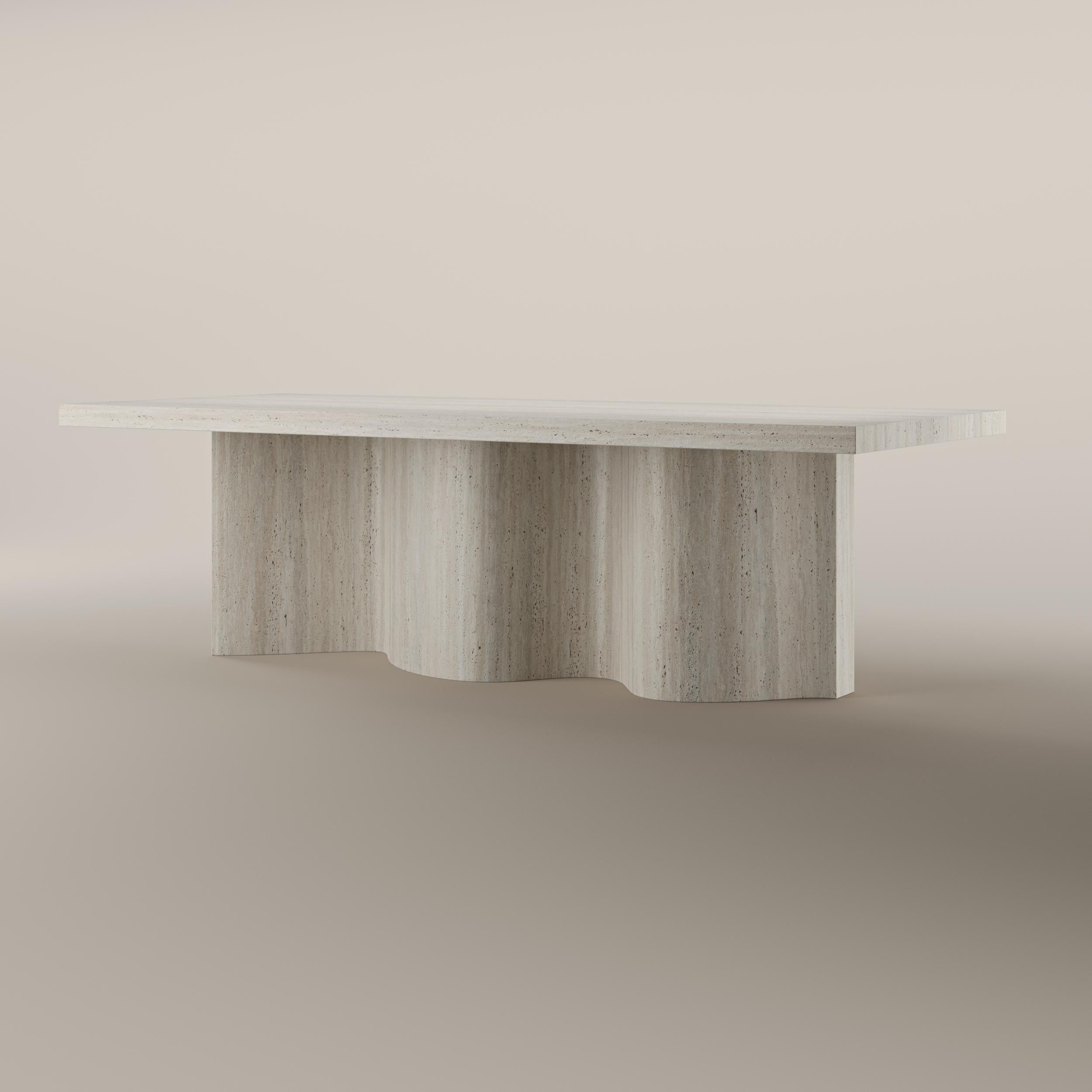 Made-to-order
Cadence Travertine
Dining table by T. Woon

The exquisite travertine dining table is indeed a manifestation of the designer's pristine aesthetics. Meticulously handcrafted by skilled artisans with top-quality materials, it showcases