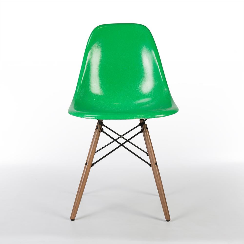 A very bright example of this iconic design. This is an original Eames Herman Miller DSW side shell finished in a luminous cadmium green. It was a slightly later inclusion in Herman Miller's line-up of the Eames's Classic design. This vibrant shell