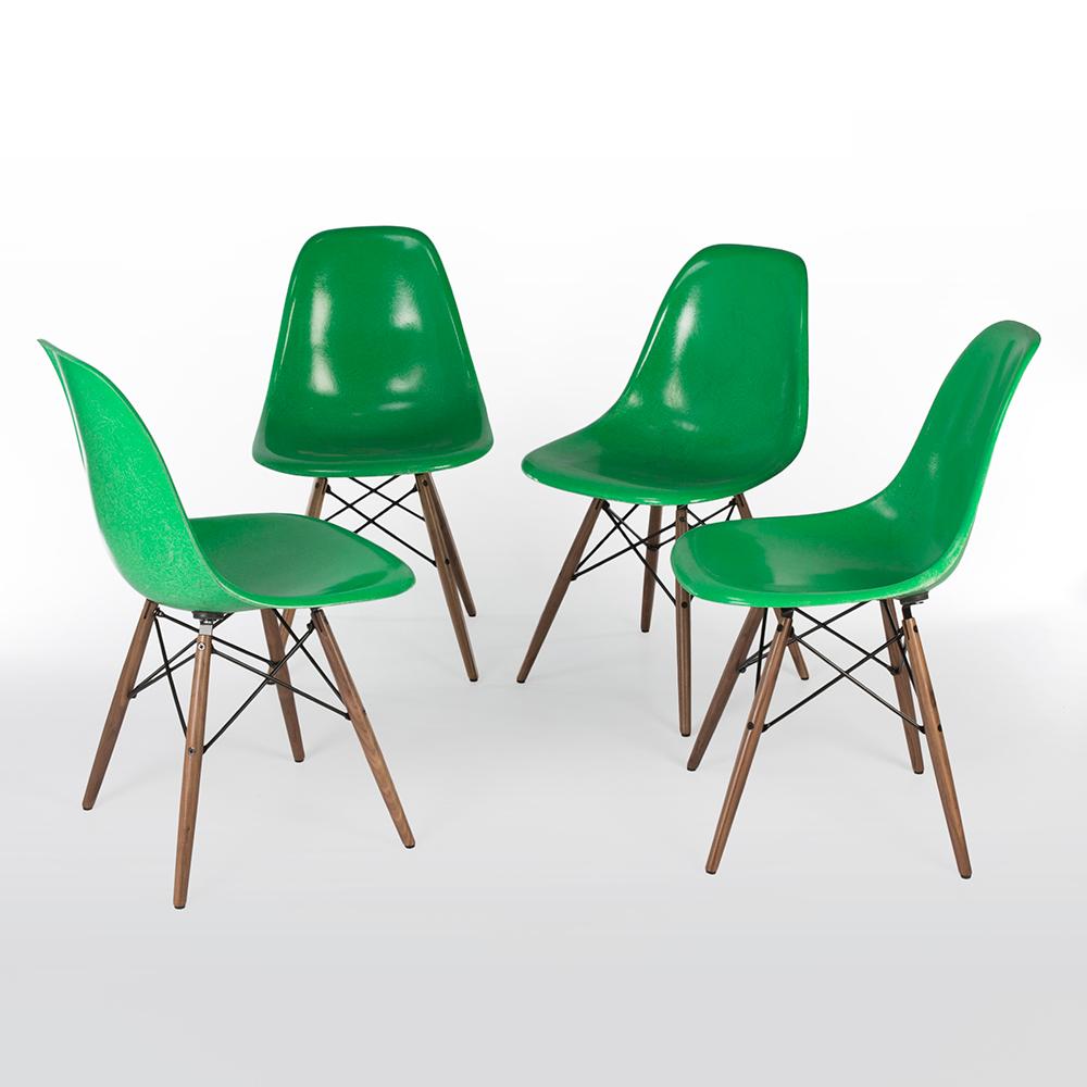 A great dining set. The perfect combination of Herman Miller cadmium green Eames side shells on the newer, used, DSW dowel base make for the perfect combination. The vibrant color of the shells has not been marred over time and there are no cracks