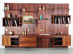 Cado Wall rosewood shelving unit by Poul Cadovious