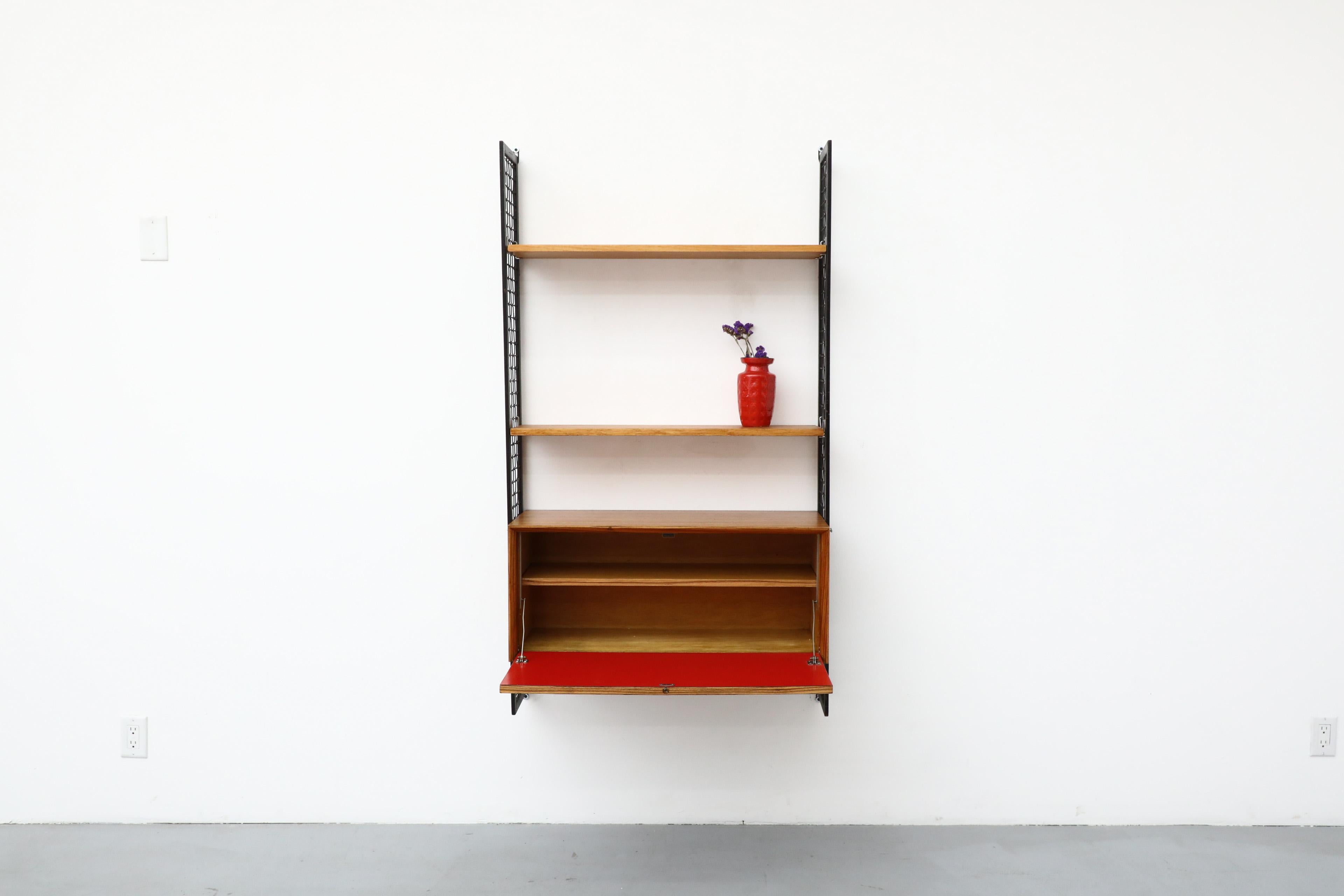 Mid-Century Modern Cadovius Style Mixed Wood Wall Unit with Black Enameled Metal Grid Risers