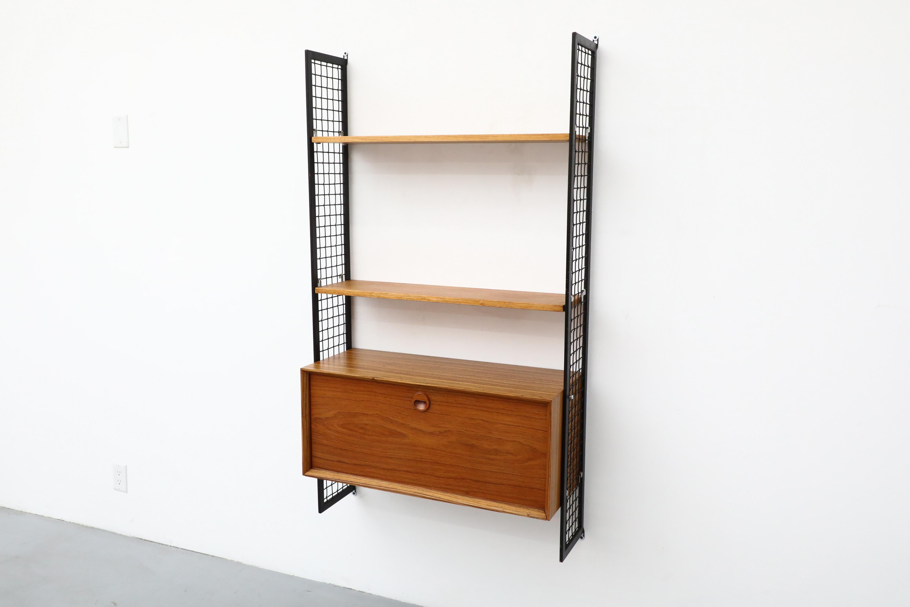20th Century Cadovius Style Mixed Wood Wall Unit with Black Enameled Metal Grid Risers