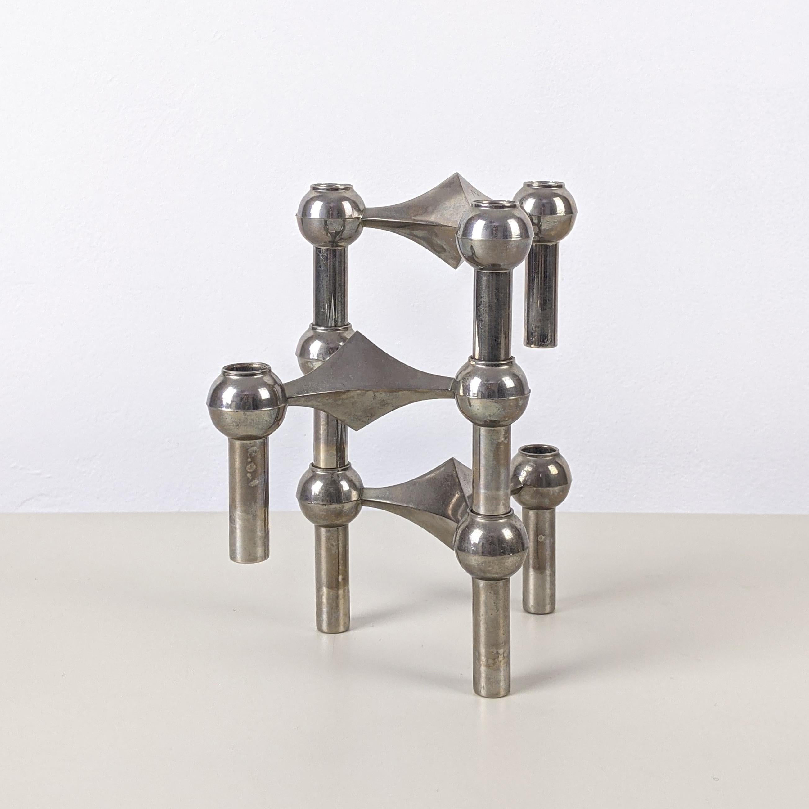 Caesar Stoffi for Fritz Nagel c. 1970
3 modular stacking candleholders

Polished metal
Good condition
One piece with original 'Nagel' label.
Please note, we prefer these candle holders un-polished with their original patina. They could,