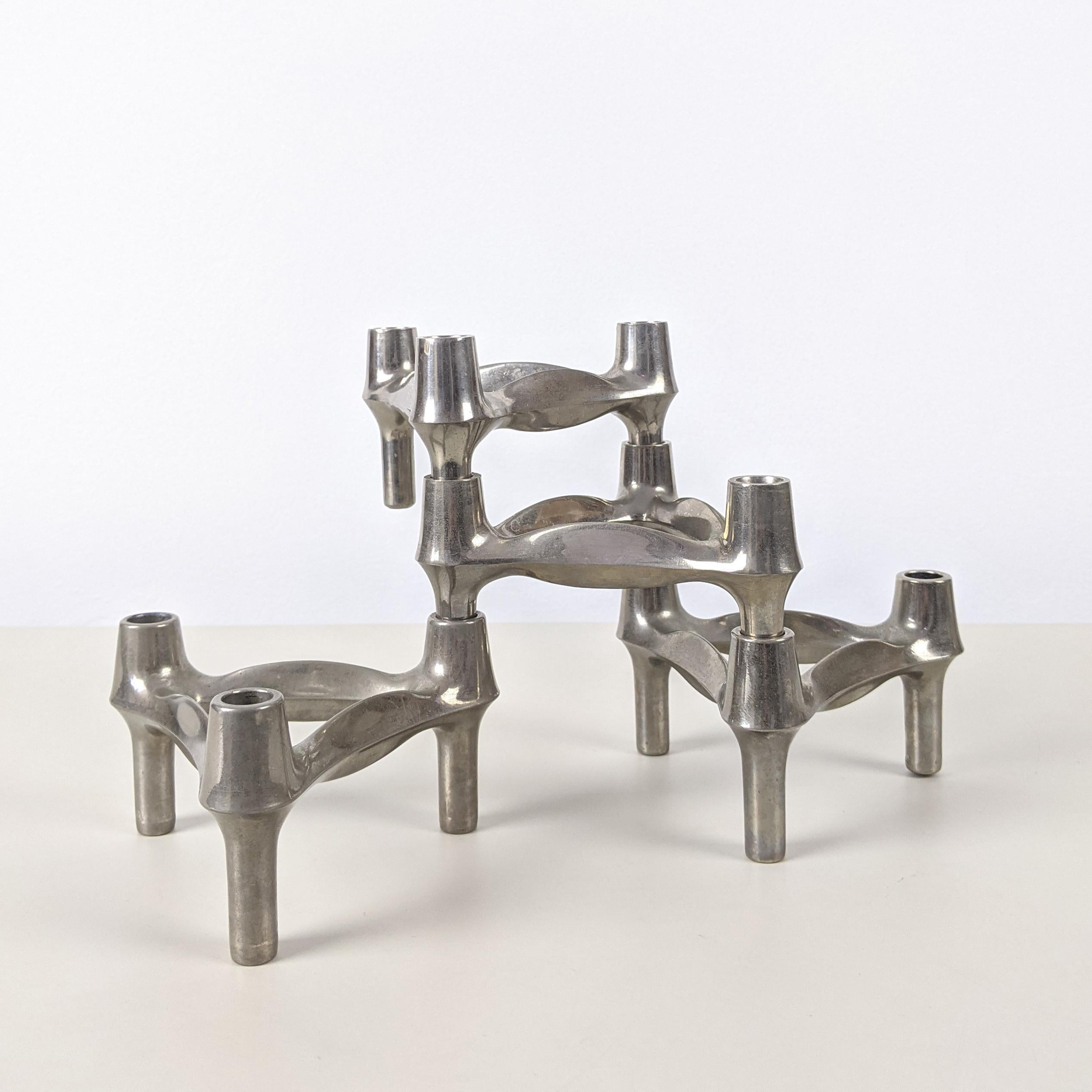 Caesar Stoffi for Fritz Nagel c. 1970
4 modular stacking candleholders

Polished metal
Good condition
Please note, we prefer these candle holders un-polished with their original patina. They could, however be easily polished to a high-shine