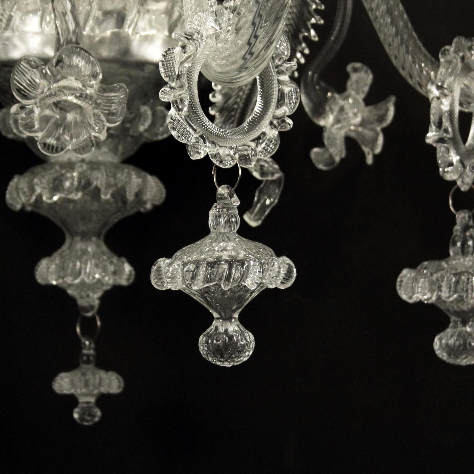 Italiano Lampada da parete Murano 4+3 bracci a doppio livello in vetro soffiato trasparente Caesar di Multiforme in vendita