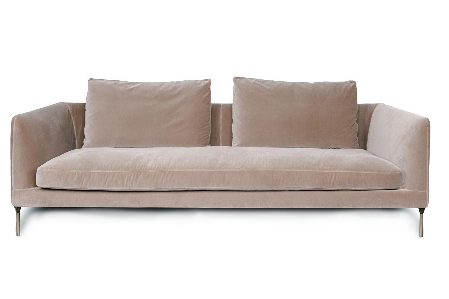 Delta sofa By Bensen

Cafe colored 100% cotton velvet upholstered removable cover straight style sofa with bronze metal legs. Smooth surfaces and soft, down-filled cushions, the Delta is a fresh and young addition to the Bensen collection. The