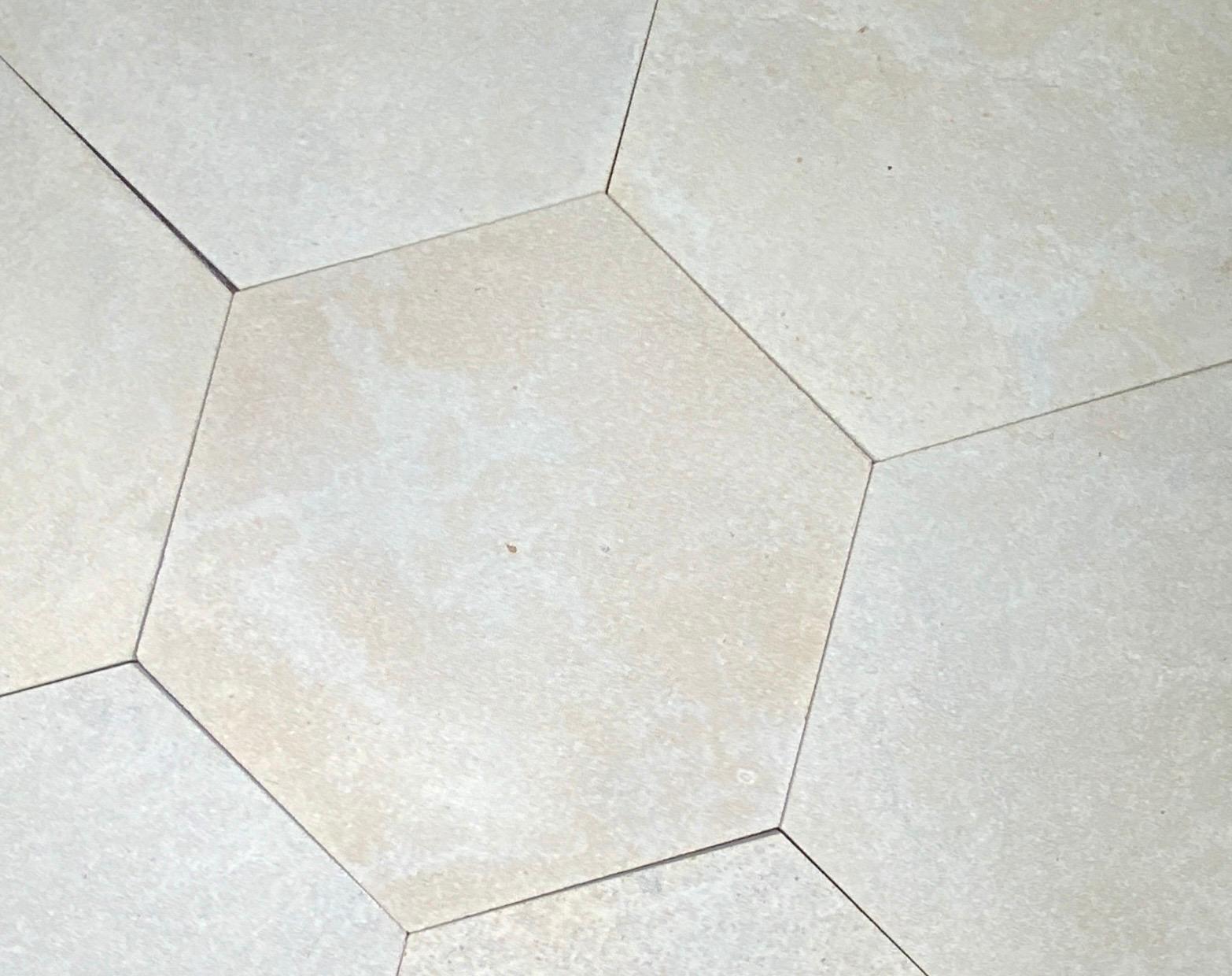 Beatifully finished hexagon tiles in the color cafe taupe. These tiles are imported from France.