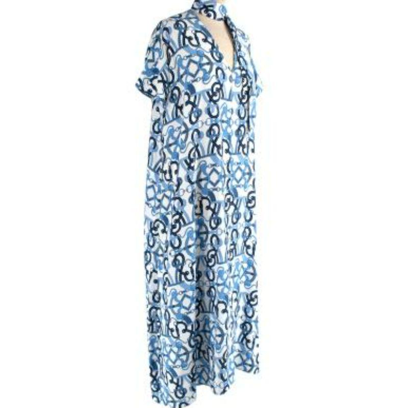 Hermes Blue and White Caftan Col Lavelliere Bleu Egee
 
 - Iconic chains print in tones of blue on an ivory silk base 
 - Lavaliere collar with plunging v-front 
 - Short sleeve
 - Relaxed, long silhouette
 
 Materials:
 100% Silk 
 
 Made in France