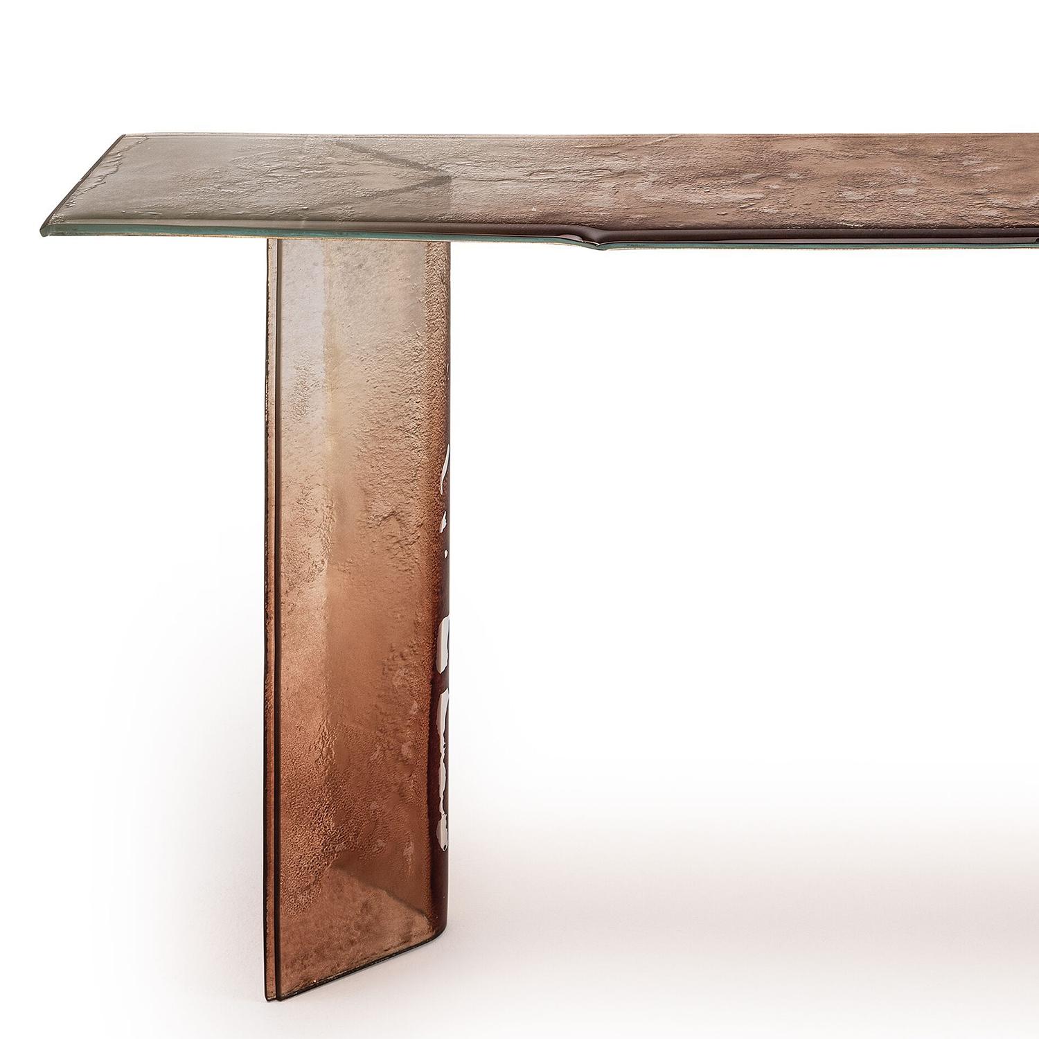 Console  Table glass Cagliari with structure in 
baked glass, top with irregular edges. All the
glass parts are varnished in gradation from
bronze to clear glass, with partial silvering 
on the back.
