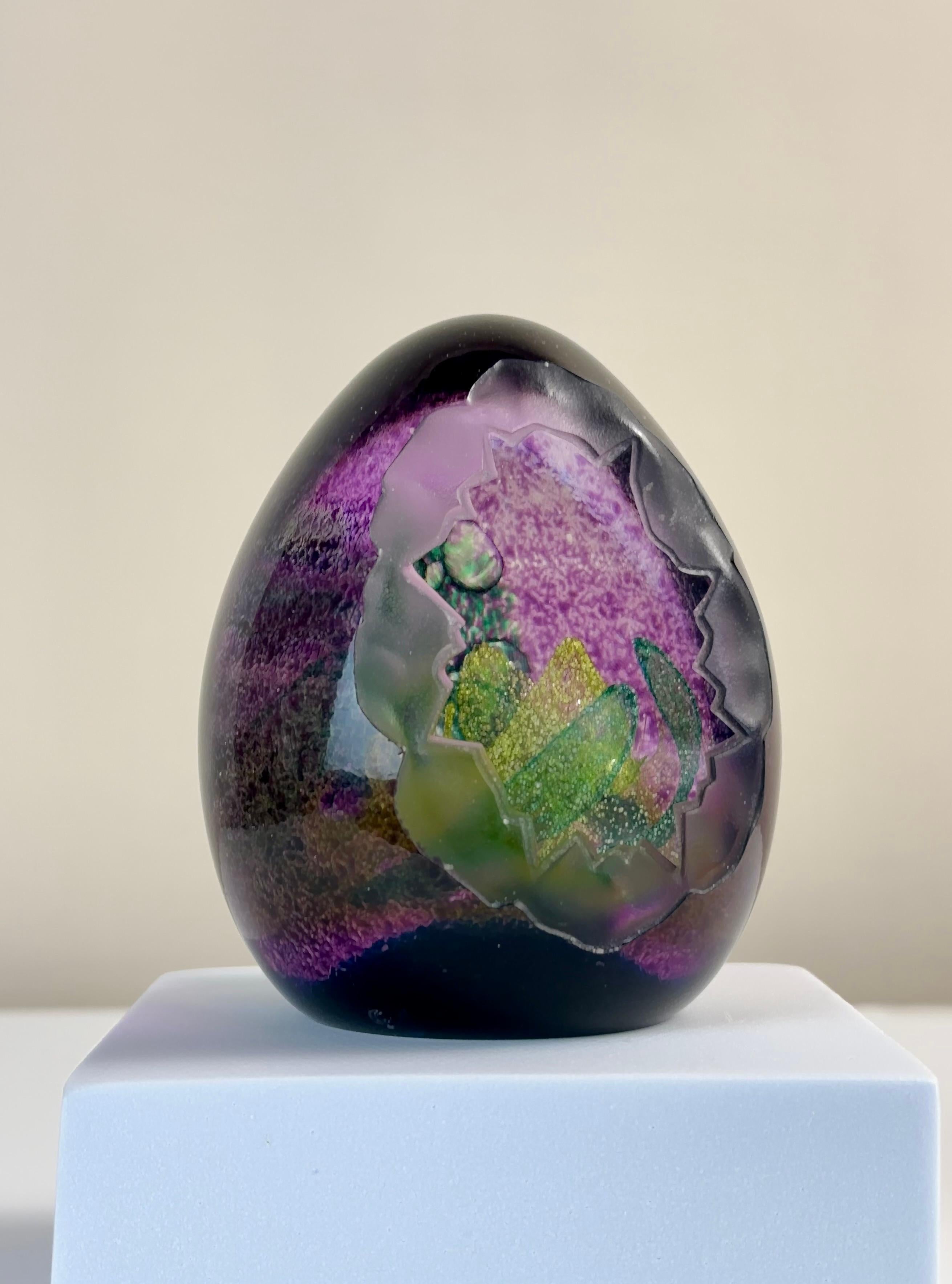 Limited edition Caithness paperweight, designed by the celebrated caithness glass artist Colin Terris.

Named ‘emerald grotto’ the paperweight is a wonderful example of glassmaking skill and technique. Presented in a large egg shape, the inside
