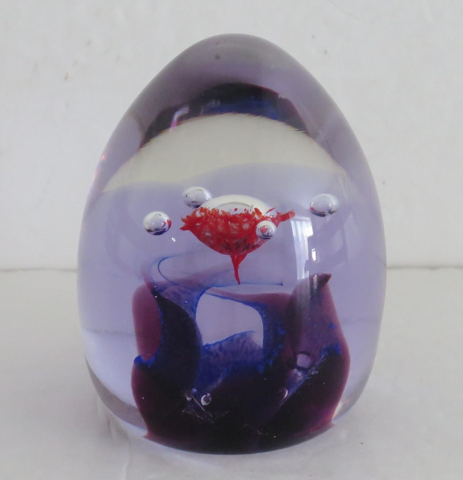 This is a beautiful Caithness glass paperweight named 