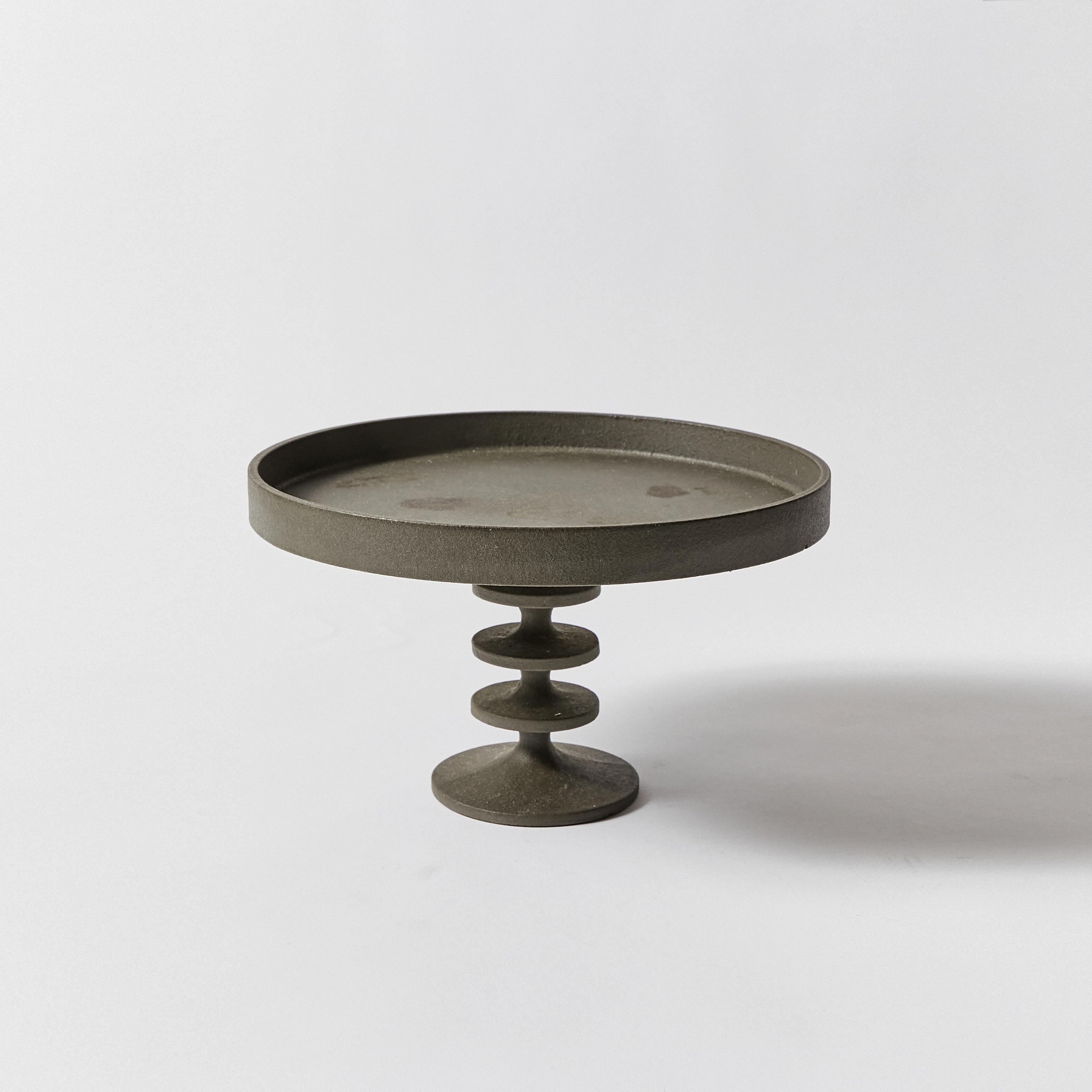 Cake stand made in blackened cast iron. Designed by Robert Welch. Signature stamp on bottom.