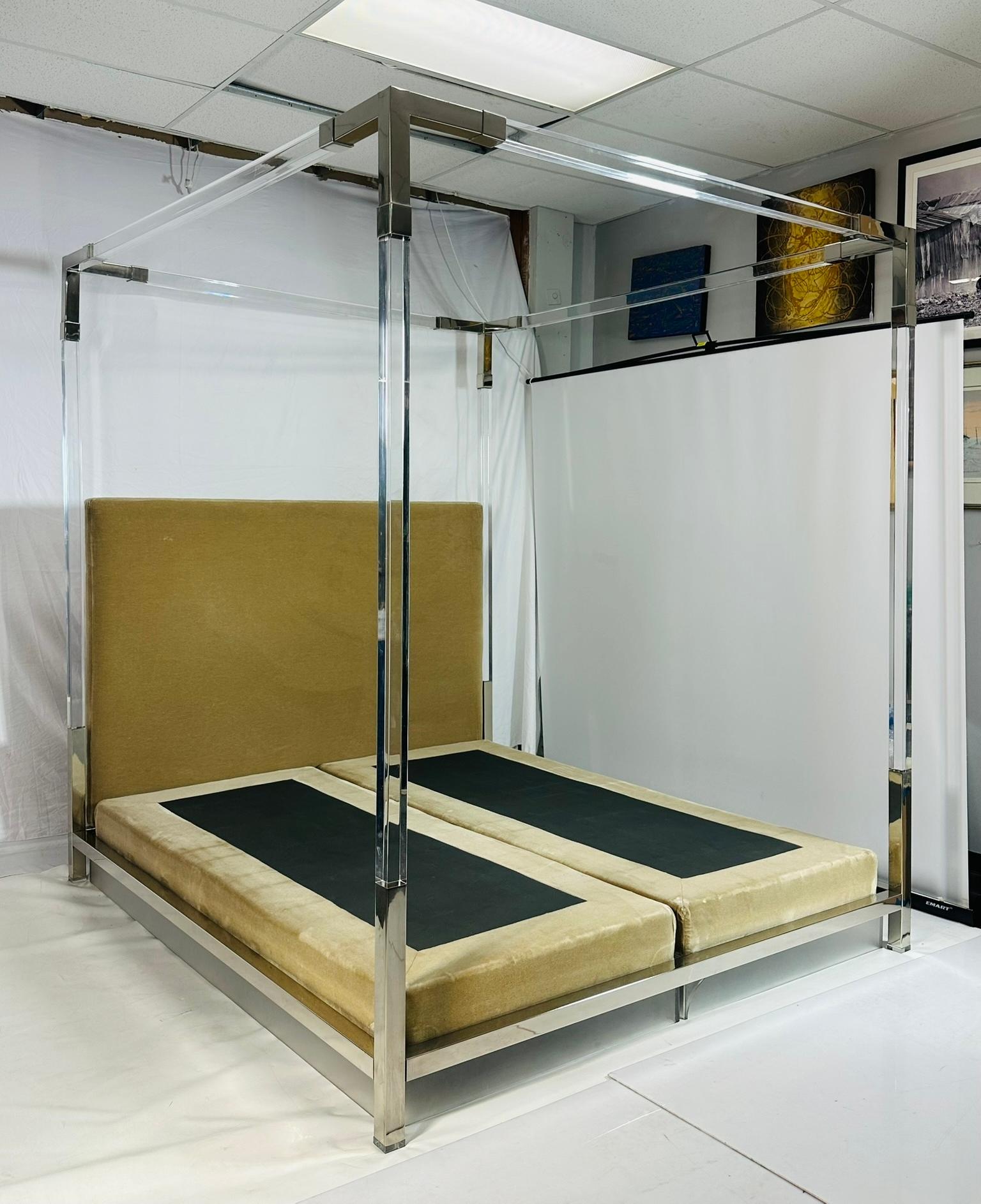 Elevate your bedroom with this stunning Cal-King 4 Poster Bed in Polished Nickel & Lucite designed and manufactured in the United States by renowned designer Charles Hollis Jones in the 1980s and part of the 