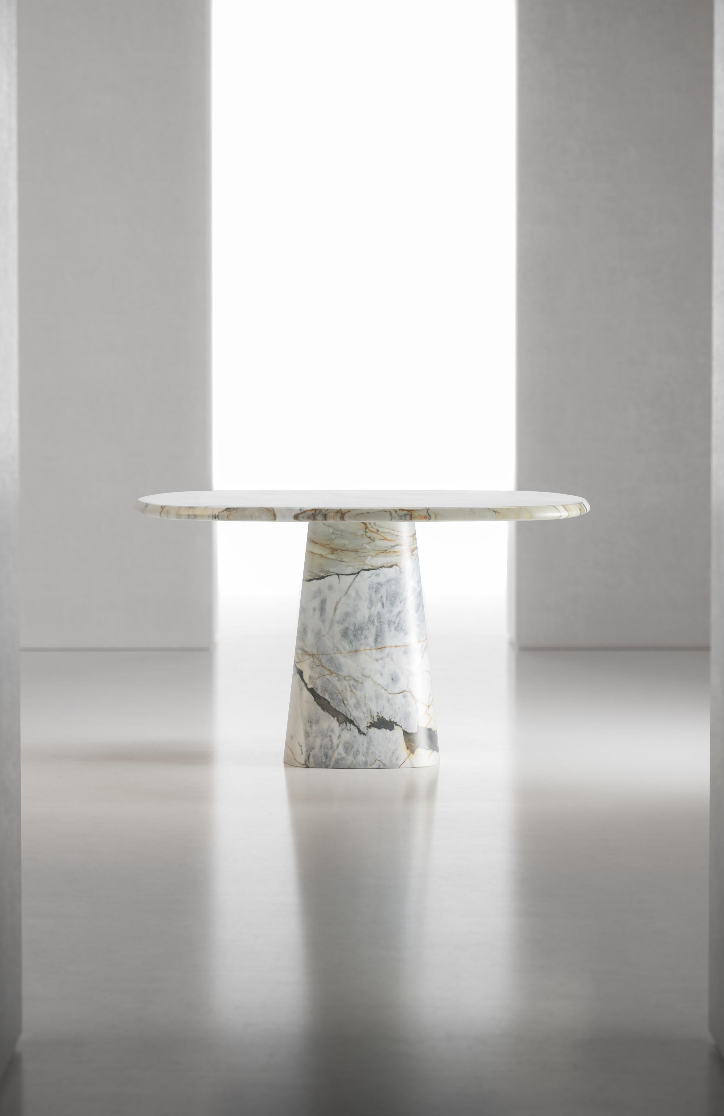 Transformez votre espace repas en un chef-d'œuvre sculptural avec l'extraordinaire table à manger Wedge, où l'artisanat monumental du marbre rencontre l'innovation du design contemporain dans une harmonie à couper le souffle.

Notre table Wedge
