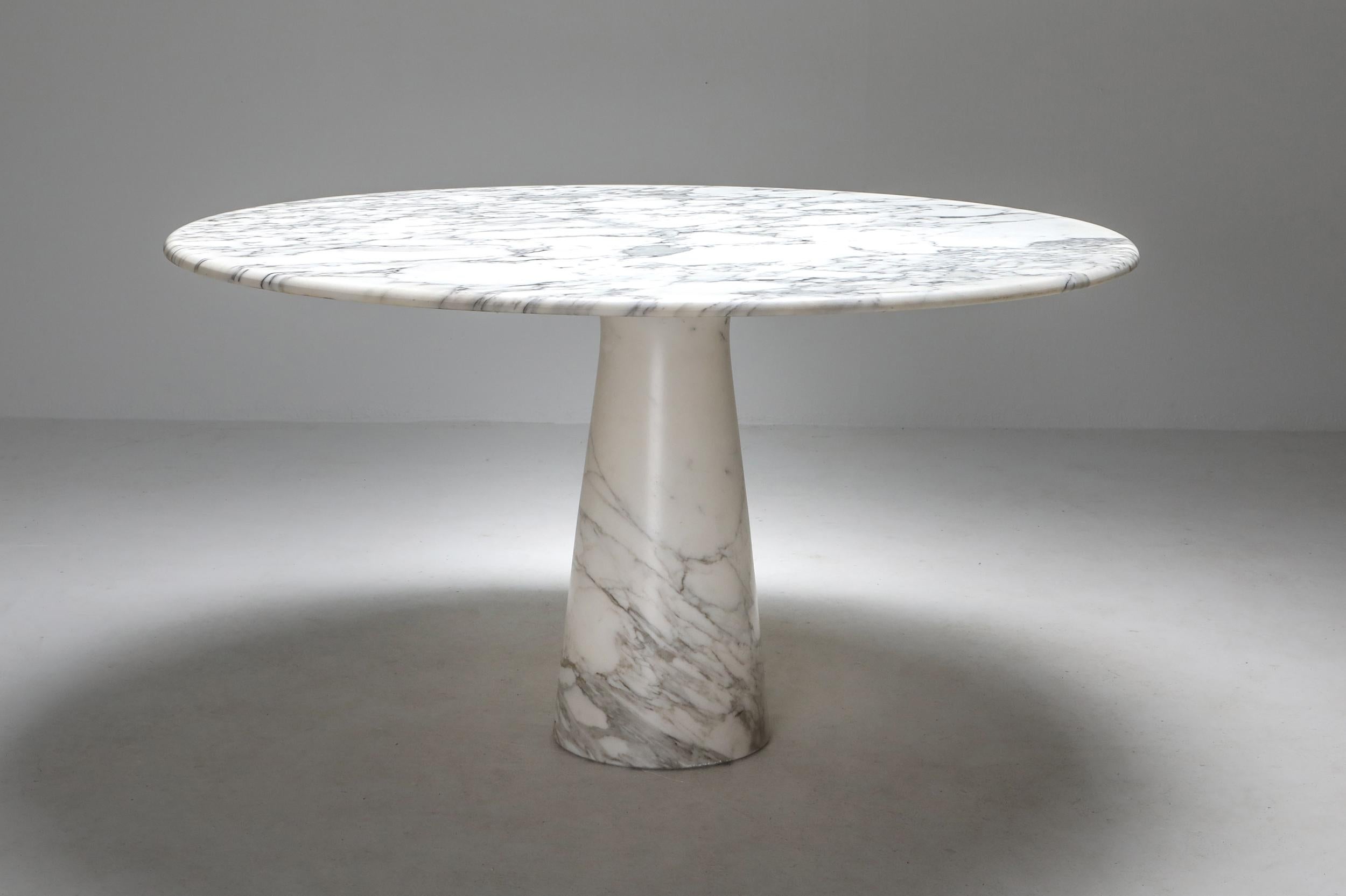 Angelo Mangiarotti designed this Postmodern round dining table in 1972, produced by Skipper, Italy.
This is an authentic piece from that era and not a new edition.

Beyond his many architectural feats, Mangiarotti’s portfolio includes a wide