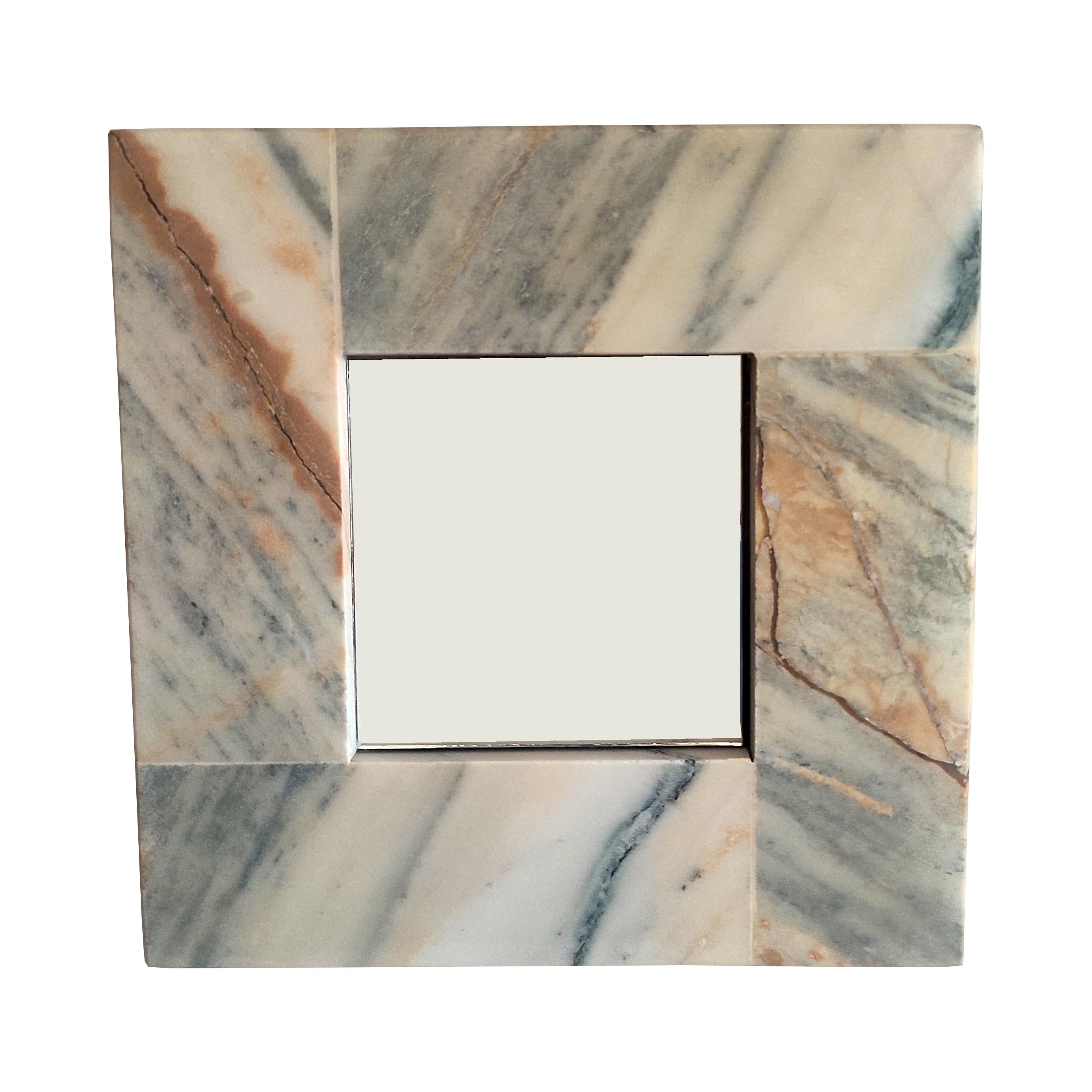 Calacatta Marble Mirror Italian Marble Contemprary Design Luxury Gift Made Spain
This handcrafted square mirror with an Italian Calacatta marble frame is a stunning decorative piece that makes an ideal gift for someone who appreciates thoughtful