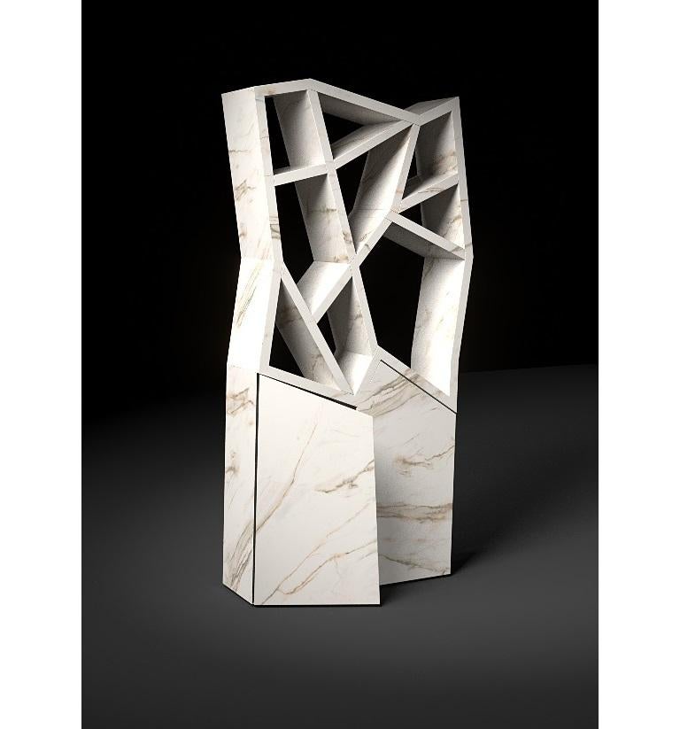 Libreria Calacatta Meet di Andrea Giomi
Dimensioni: P 45 x L 90 x H 200 cm
Materiali: Marmo Calacatta.
Disponibile anche in marmo di Carrara.

Andrea Giomi, è nato a Castelfiorentino, in provincia di Firenze, nel
1970. Sviluppa la sua formazione ed