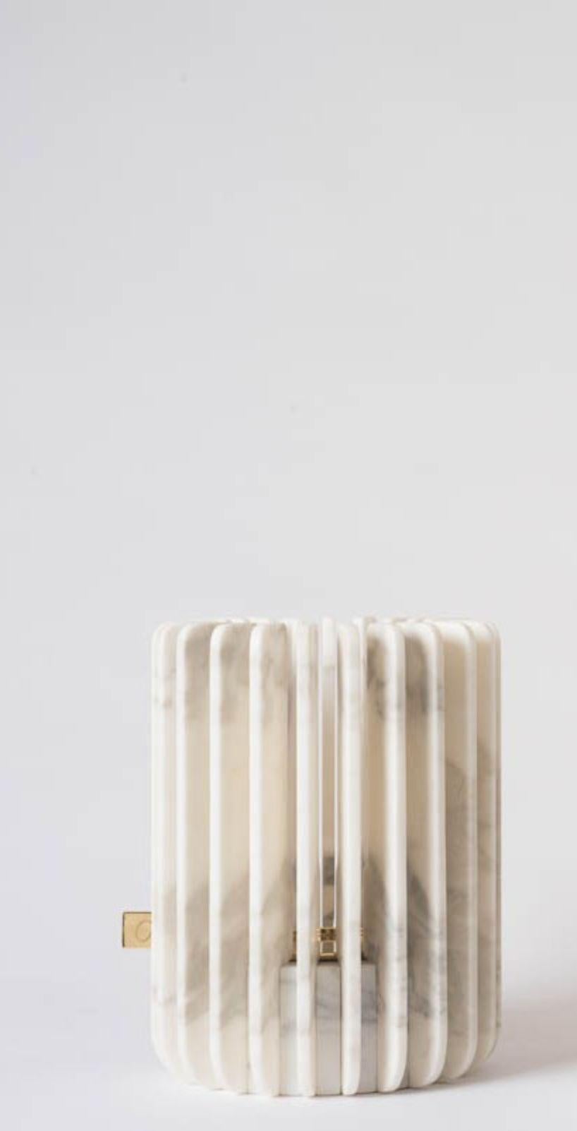 Calacatta Orion candleholders by Dan Yeffet
Dimensions: Ø 19.7 x H 25 cm 
Materials: Marble 

Size available: 
Ø 18.7 x H 12 cm 
Ø 19.7 x H 25 cm 
Ø 32 x H 12 cm 

Marble available: 
Marquina
Grey Saint
